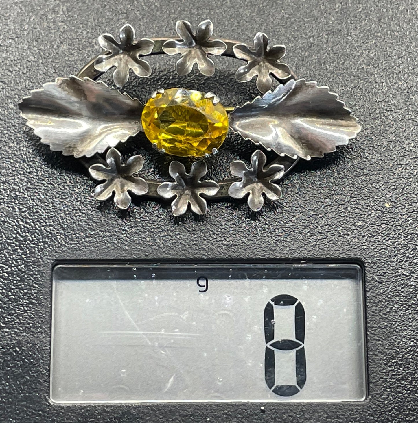 Antique sterling silver and large citrine yellow paste rhinestone brooch, pretty flower and leaf design, stamped 'SILVER', weighs 8 grams