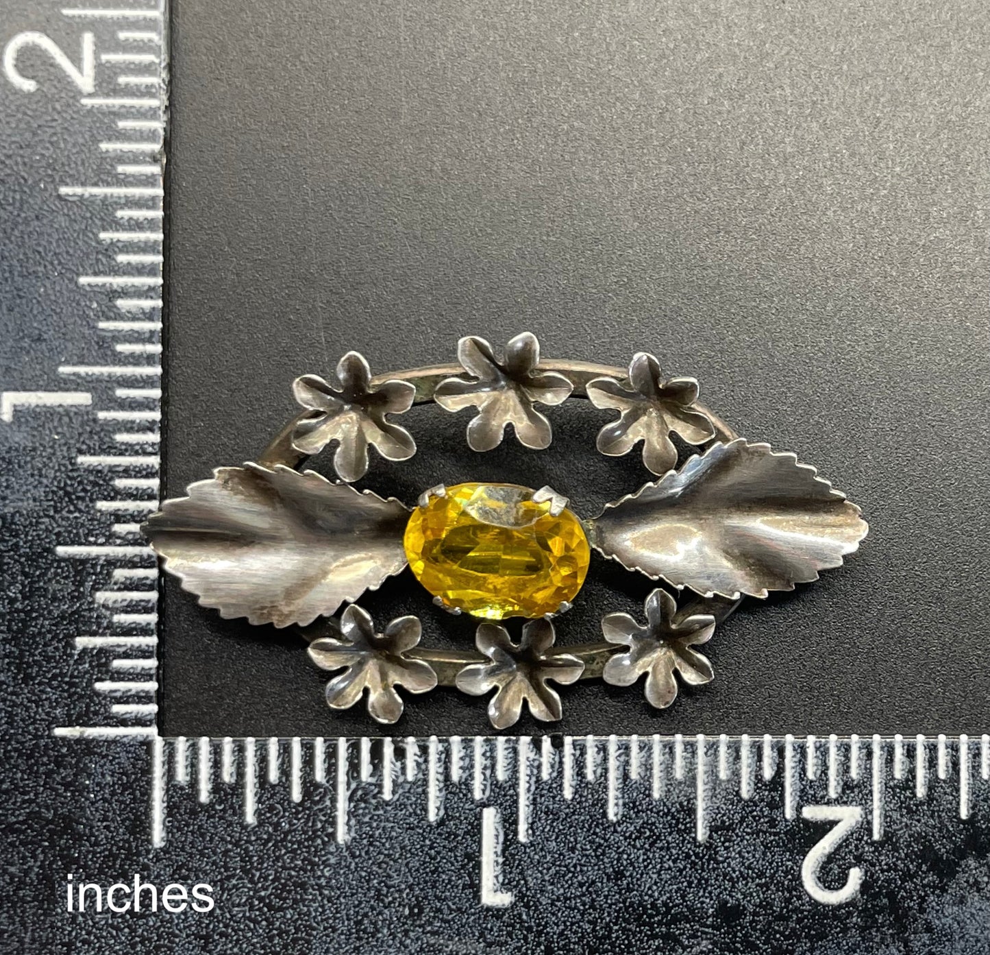 Antique sterling silver and large citrine yellow paste rhinestone brooch, pretty flower and leaf design, stamped 'SILVER', weighs 8 grams