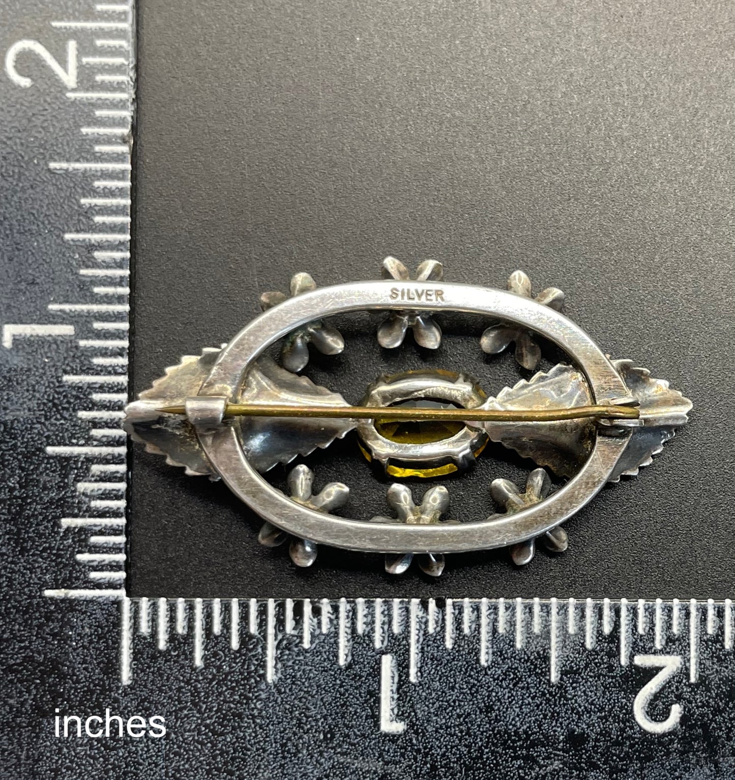 Antique sterling silver and large citrine yellow paste rhinestone brooch, pretty flower and leaf design, stamped 'SILVER', weighs 8 grams