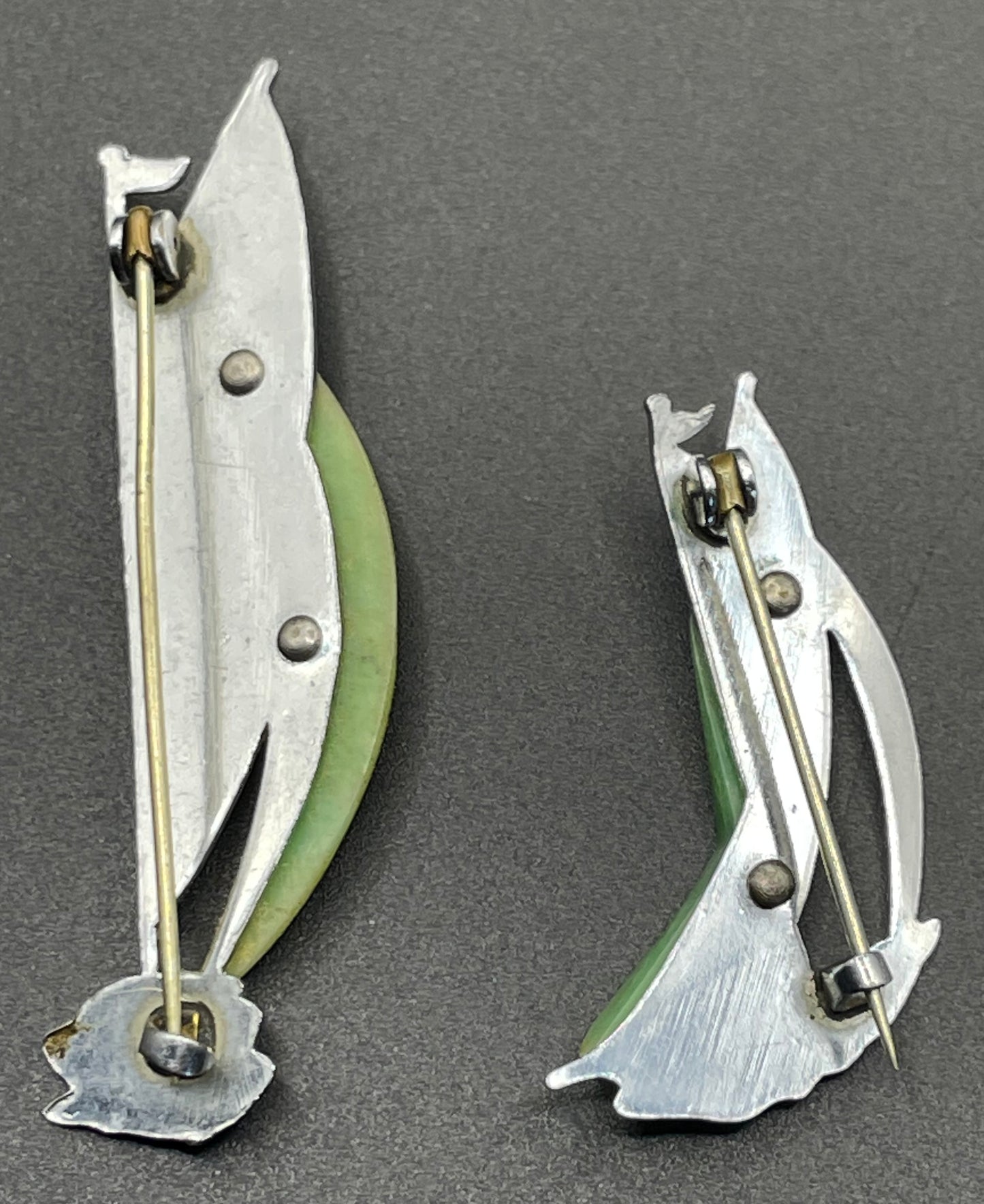 Pair of vintage Jakob Bengel yacht / sail boat brooches - Art Deco 1930s machine age, green galalith and engraved chrome, read for condition