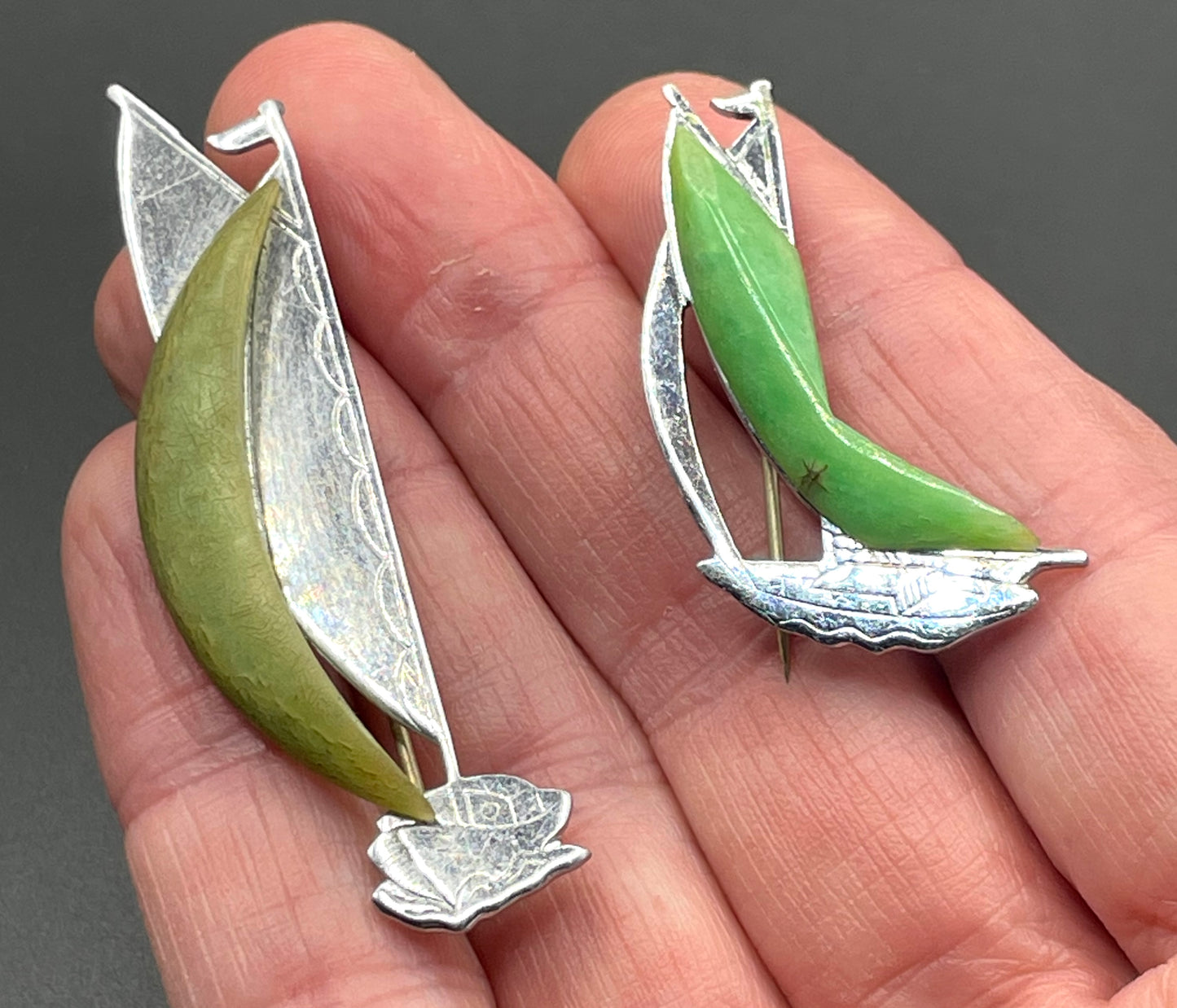 Pair of vintage Jakob Bengel yacht / sail boat brooches - Art Deco 1930s machine age, green galalith and engraved chrome, read for condition