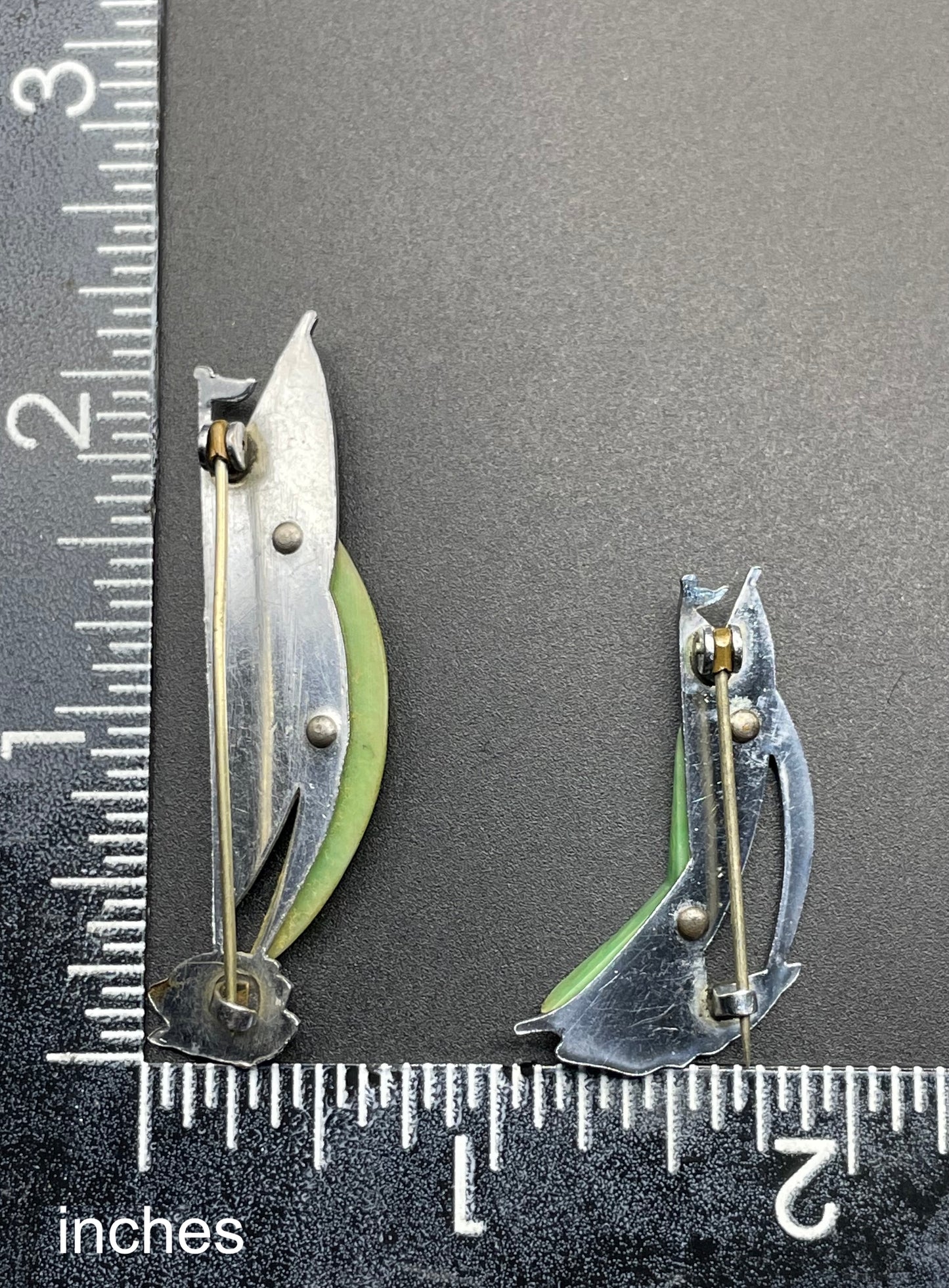 Pair of vintage Jakob Bengel yacht / sail boat brooches - Art Deco 1930s machine age, green galalith and engraved chrome, read for condition