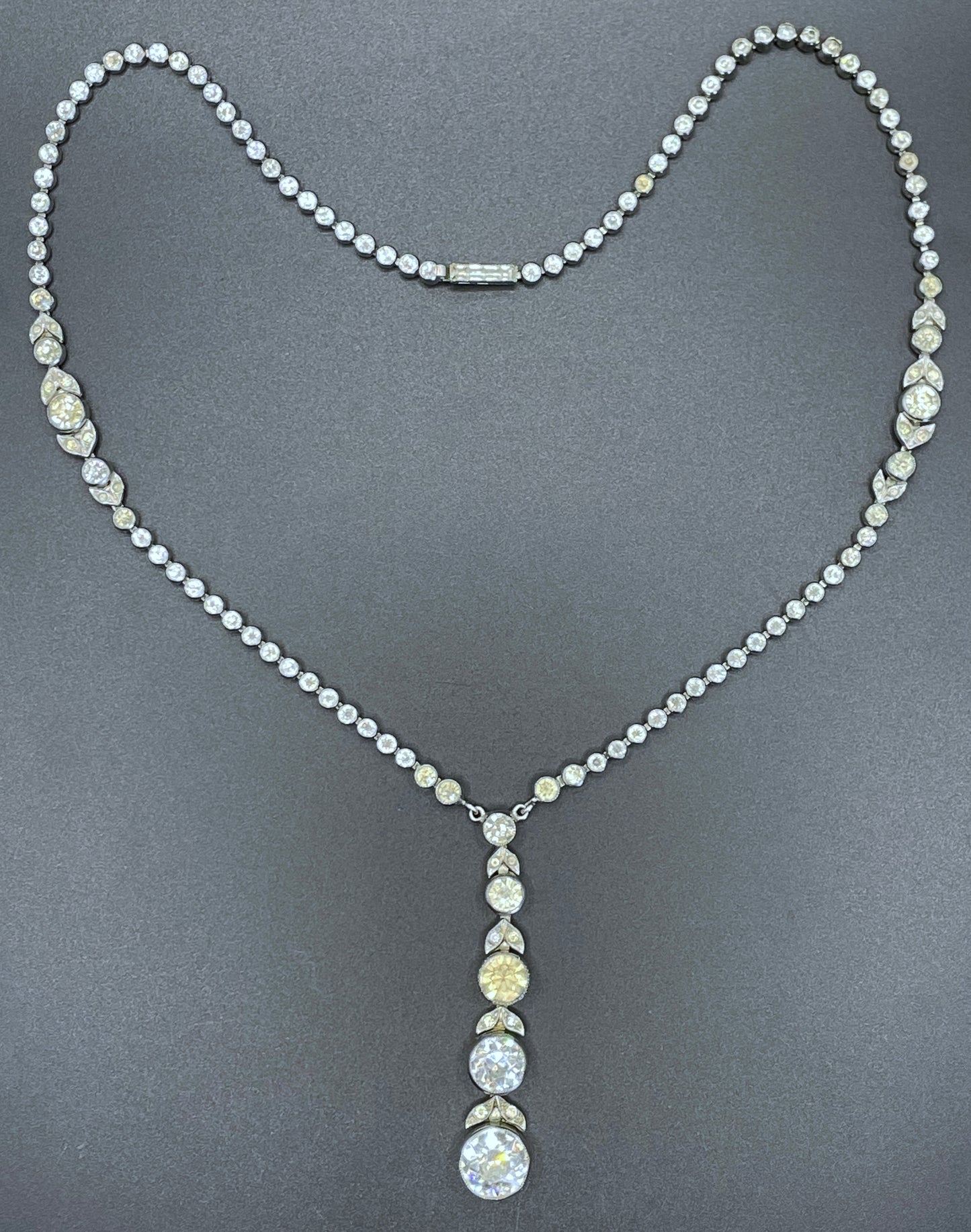 Vintage Art Deco Czech crystal paste and silver tone collet set riviere lariat Y necklace, classic and beautiful bud and leaf design