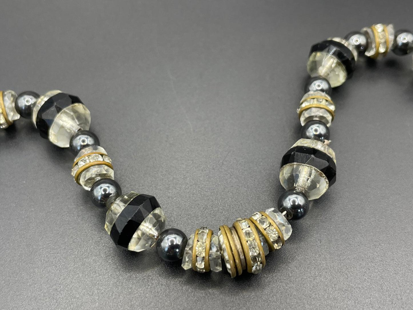 Vintage Art Deco clear and black crystal faceted glass bead necklace with rhinestone rondelle beads with ornate screw clasp