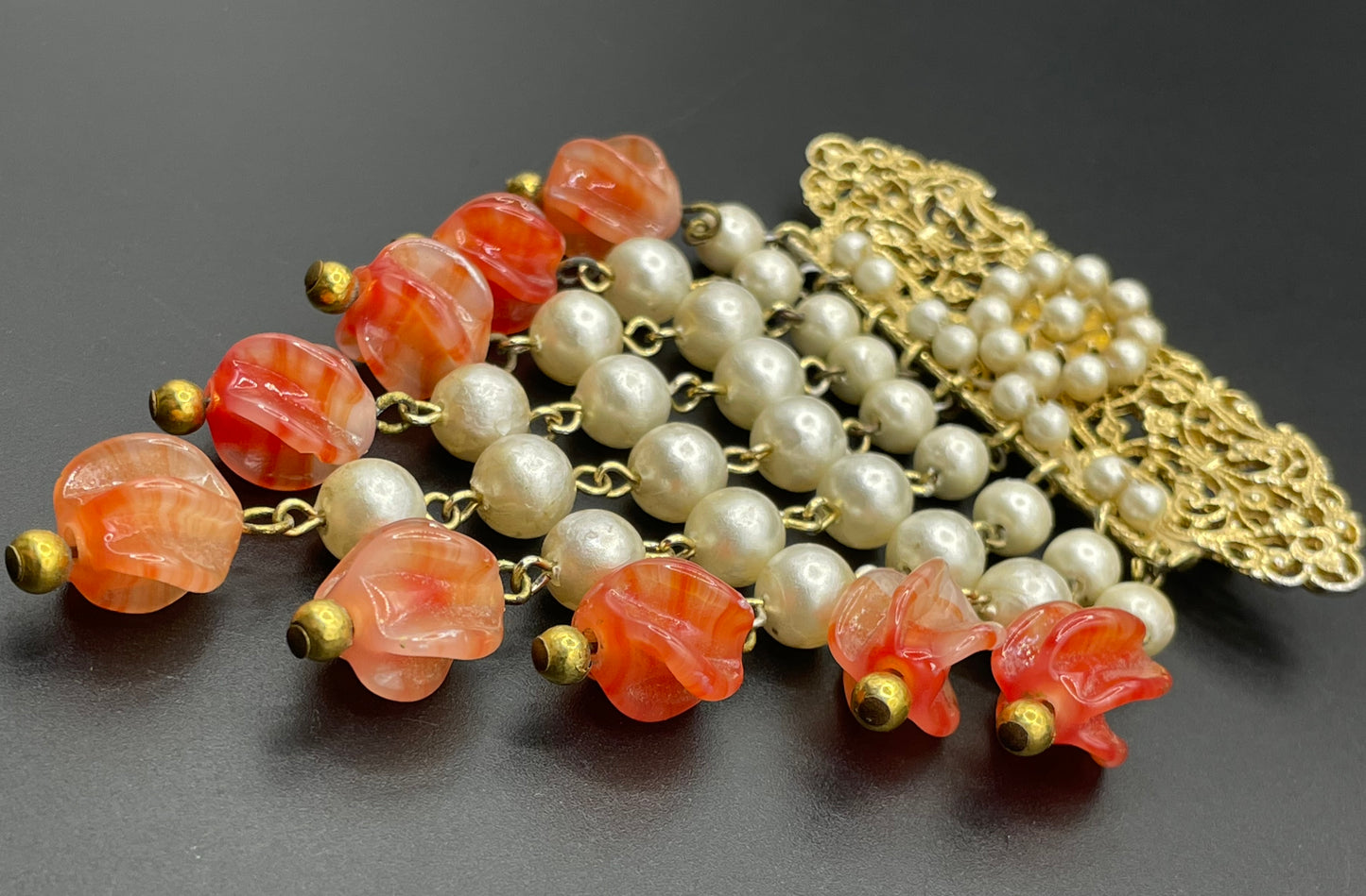 Vintage Louis Rousselet marbled orange moulded / poured glass bead and faux pearl fringe brooch with gold tone filigree