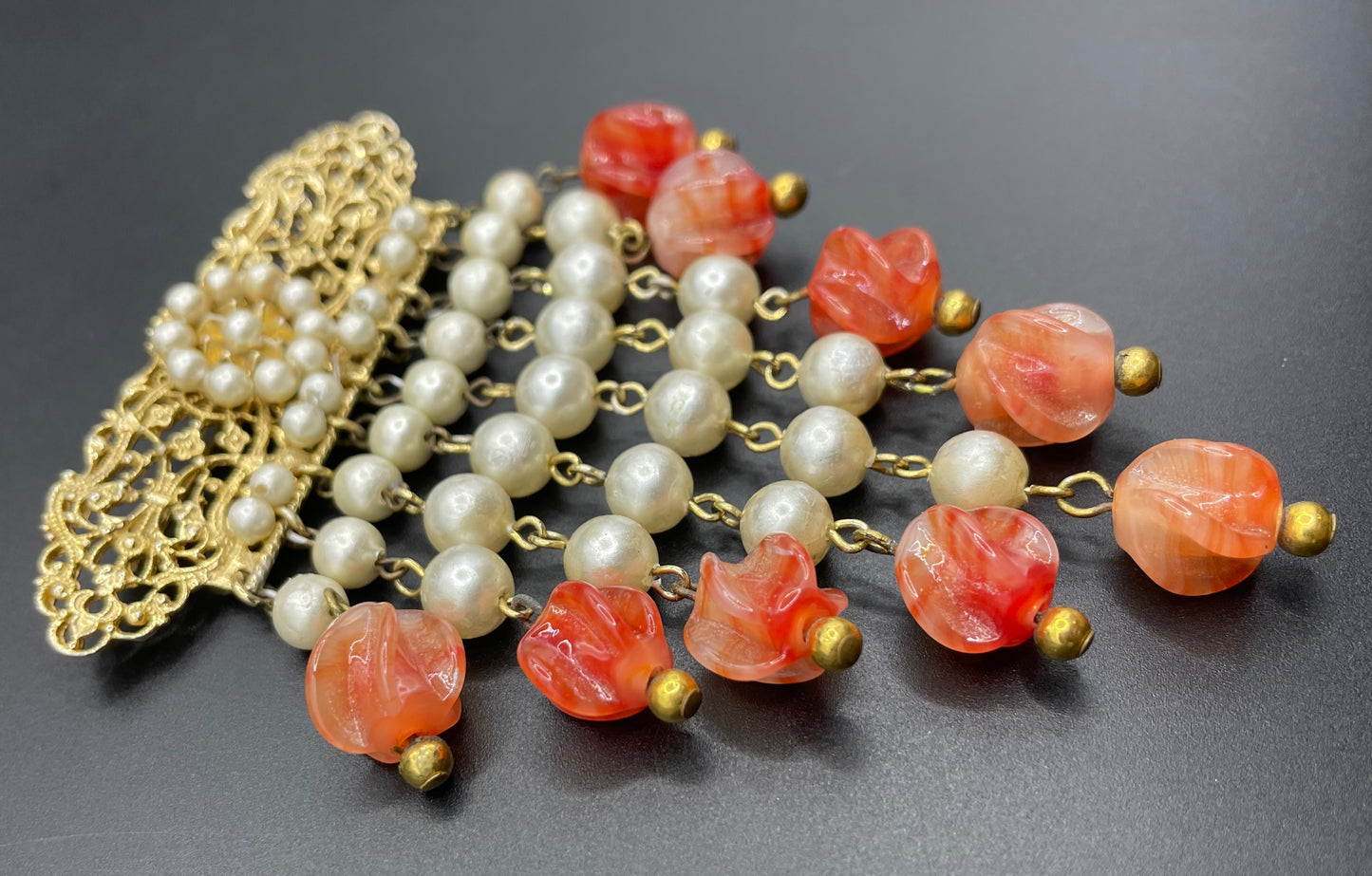 Vintage Louis Rousselet marbled orange moulded / poured glass bead and faux pearl fringe brooch with gold tone filigree