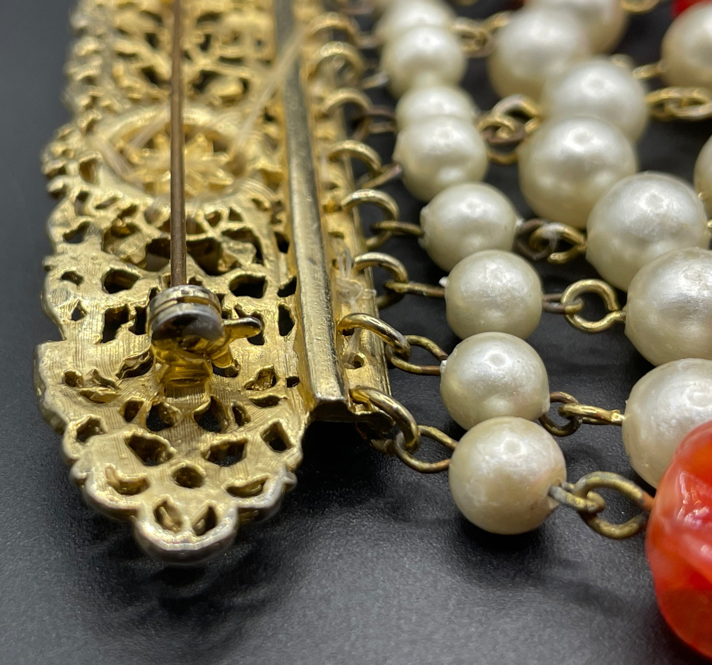 Vintage Louis Rousselet marbled orange moulded / poured glass bead and faux pearl fringe brooch with gold tone filigree