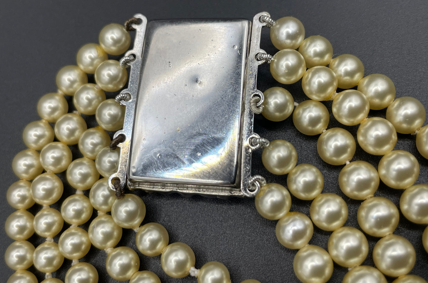 Vintage five strand glass pearl necklace (or bracelet) with double ornate ruby red & clear rhinestone side clasps, graduated glass pearls