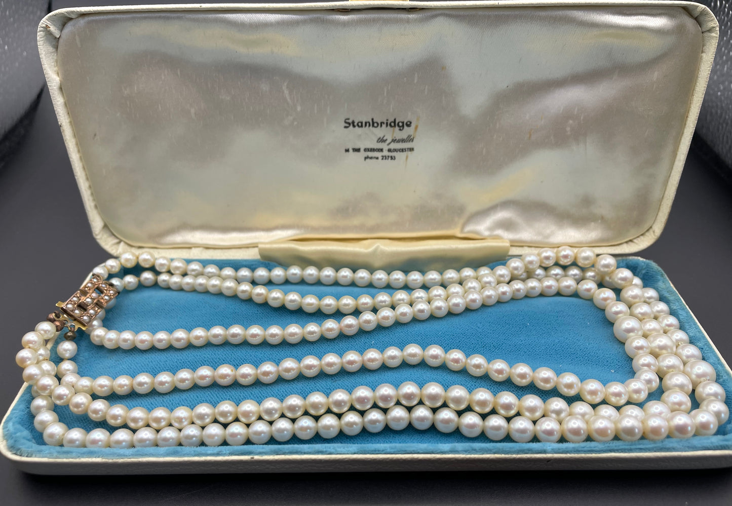 Antique real cultured 5mm pearl triple strand necklace in presentation box with pretty 9ct gold and cultured pearl cabochon clasp, 62 grams