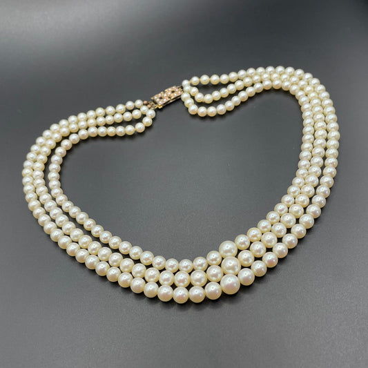 Antique real cultured 5mm pearl triple strand necklace in presentation box with pretty 9ct gold and cultured pearl cabochon clasp, 62 grams