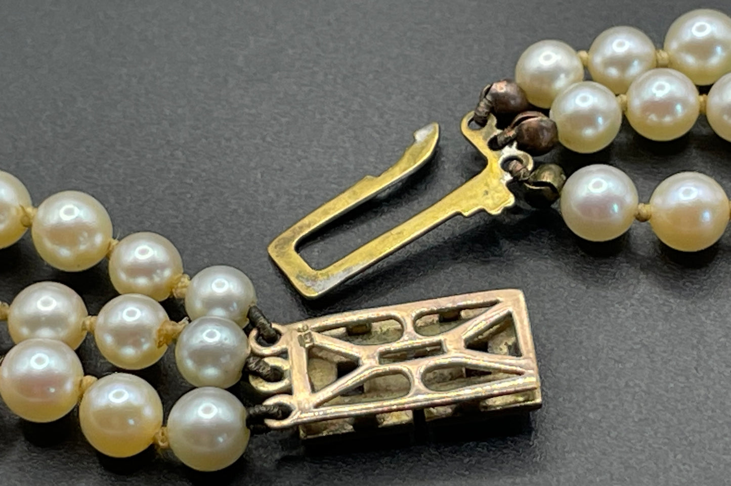 Antique real cultured 5mm pearl triple strand necklace in presentation box with pretty 9ct gold and cultured pearl cabochon clasp, 62 grams