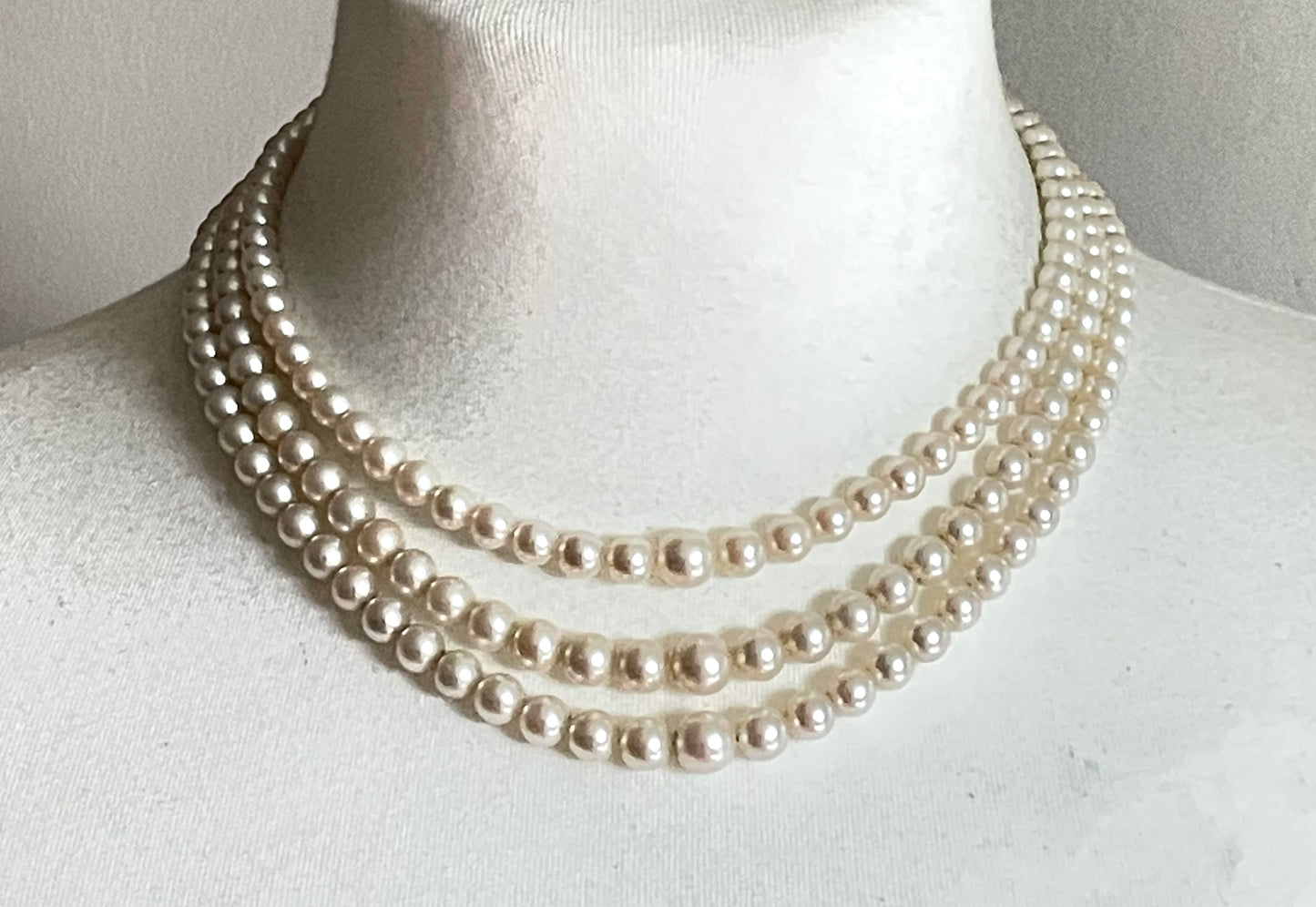 Antique real cultured 5mm pearl triple strand necklace in presentation box with pretty 9ct gold and cultured pearl cabochon clasp, 62 grams