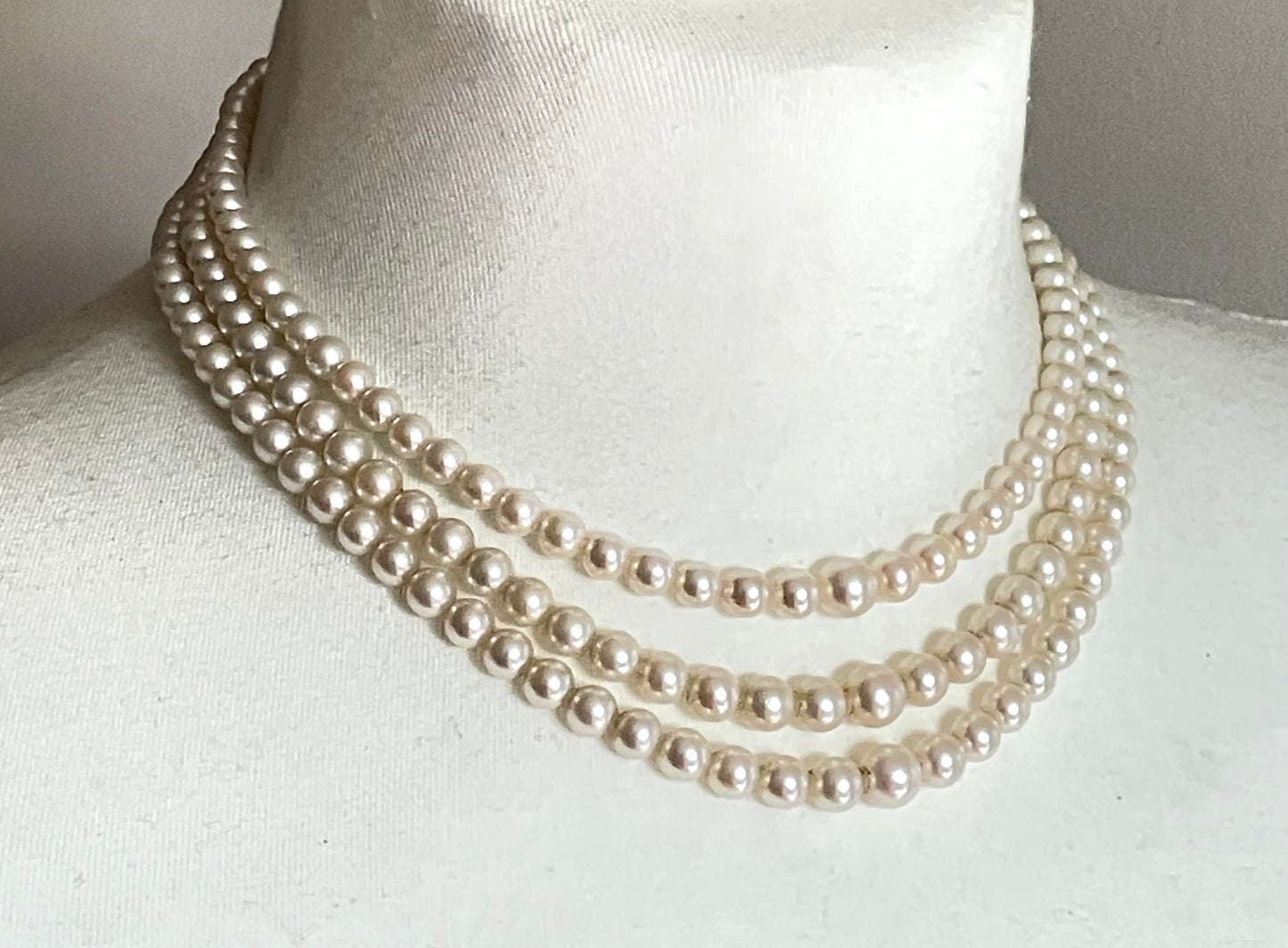 Antique real cultured 5mm pearl triple strand necklace in presentation box with pretty 9ct gold and cultured pearl cabochon clasp, 62 grams