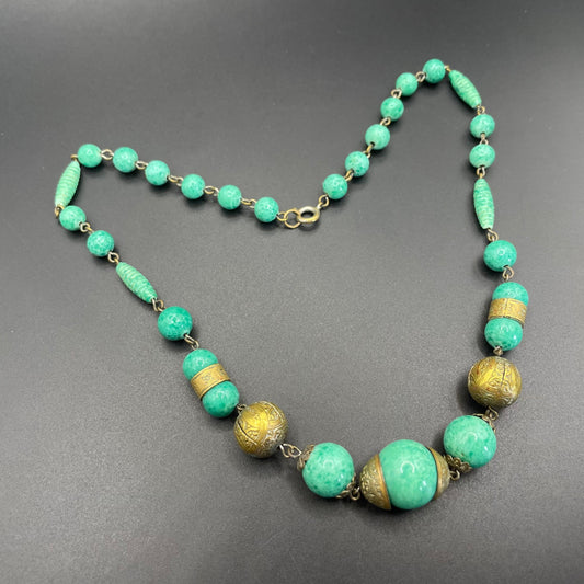 Vintage Louis Rousselet Art Deco green Peking style glass and ornate gold tone bead necklace, wired moulded glass beads