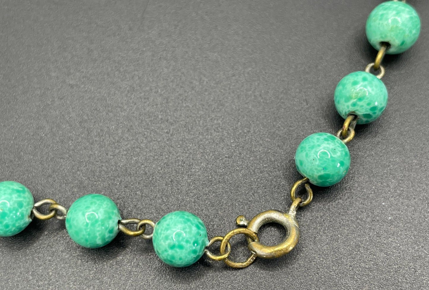 Vintage Louis Rousselet Art Deco green Peking style glass and ornate gold tone bead necklace, wired moulded glass beads