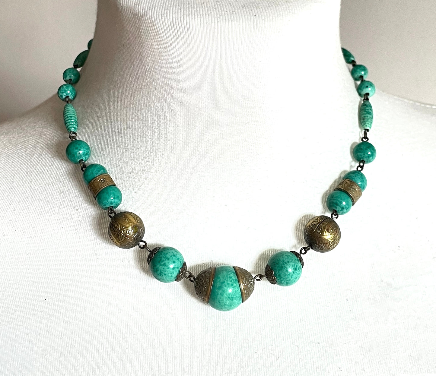 Vintage Louis Rousselet Art Deco green Peking style glass and ornate gold tone bead necklace, wired moulded glass beads