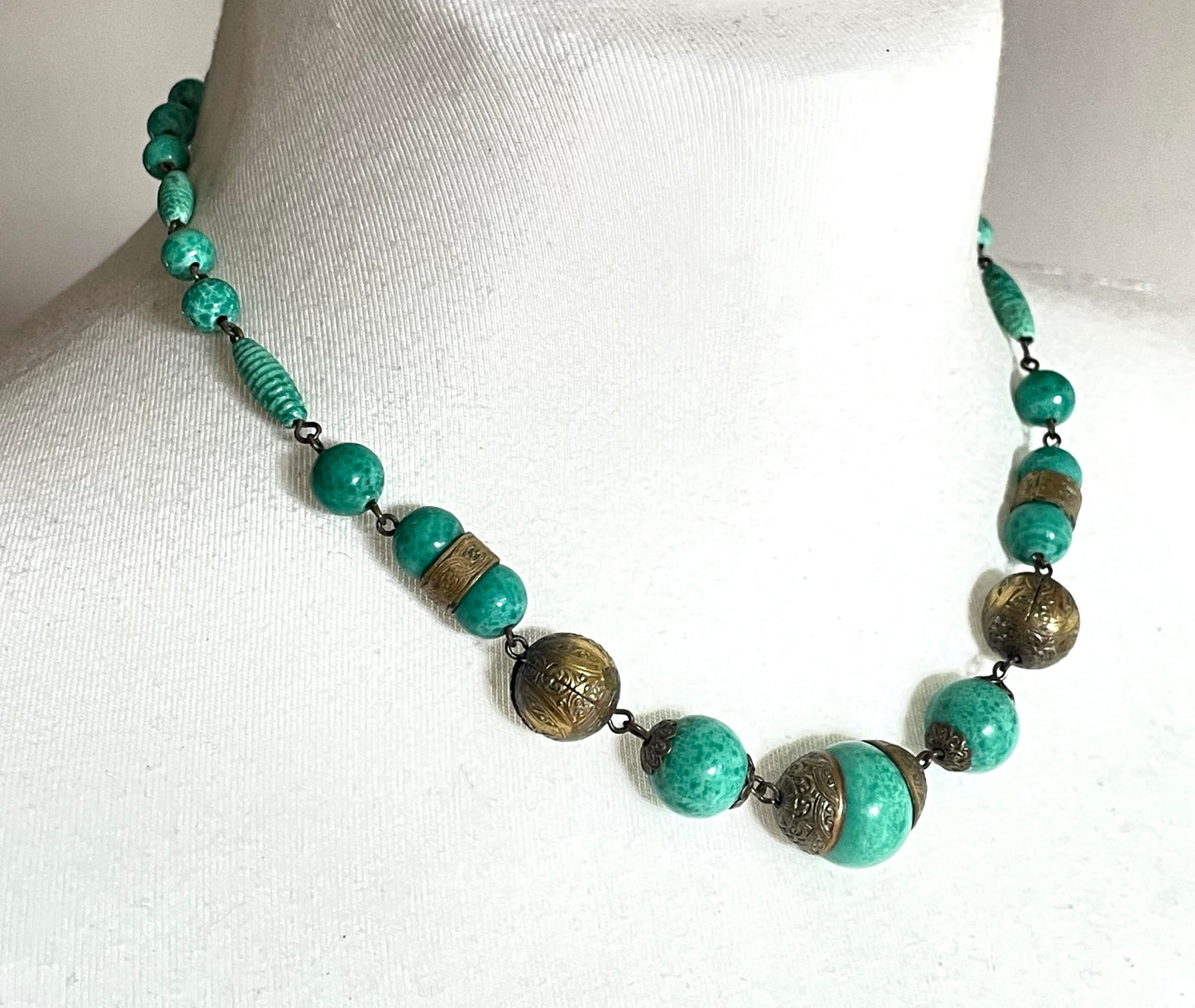 Vintage Louis Rousselet Art Deco green Peking style glass and ornate gold tone bead necklace, wired moulded glass beads