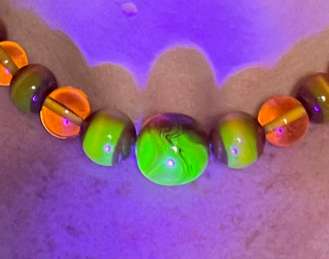 Vintage Louis Rousselet uranium glass Art Deco necklace on foxtail chain - cats' eye UV sensitive and transparent orange beads