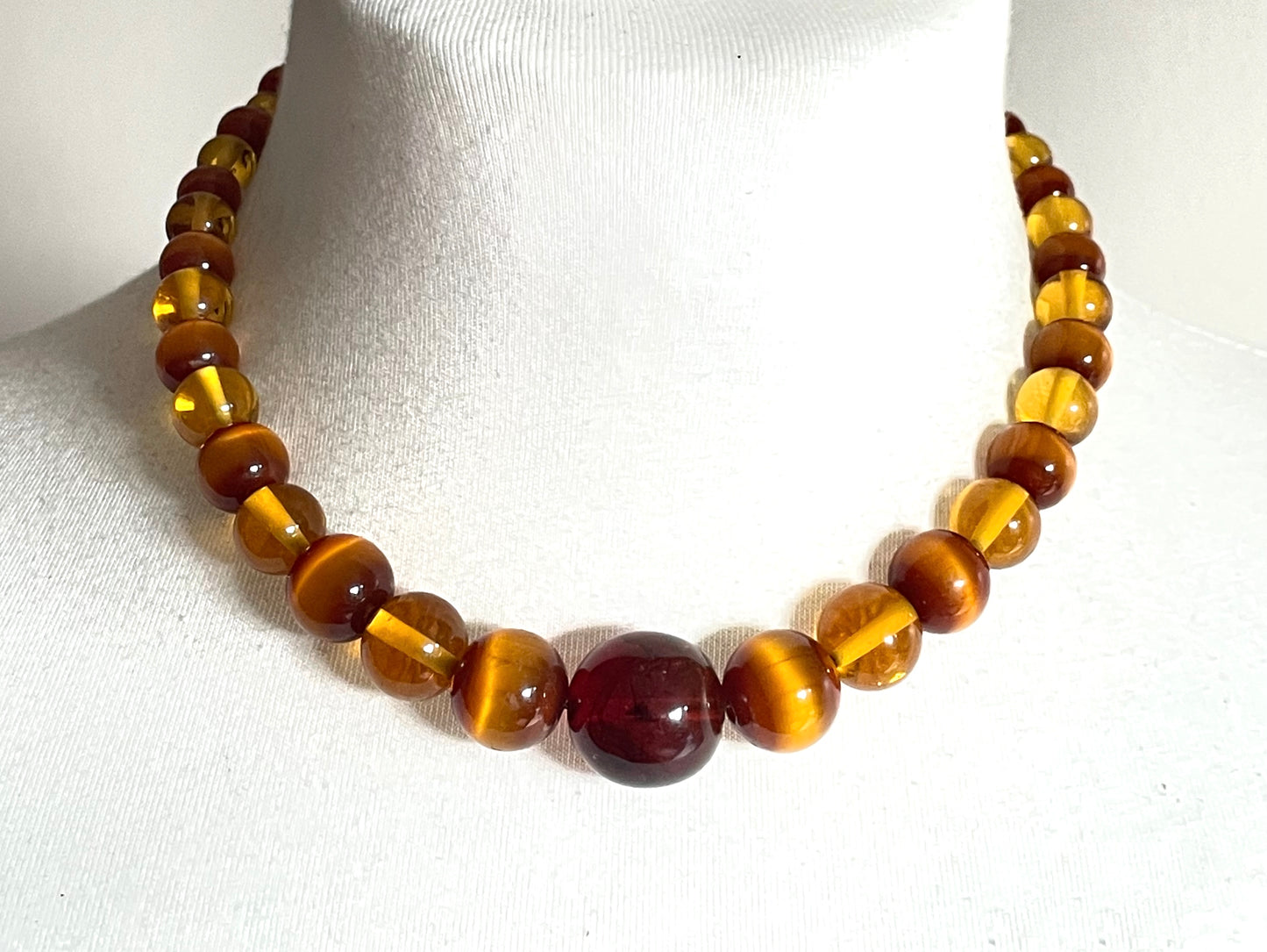 Vintage Louis Rousselet uranium glass Art Deco necklace on foxtail chain - cats' eye UV sensitive and transparent orange beads