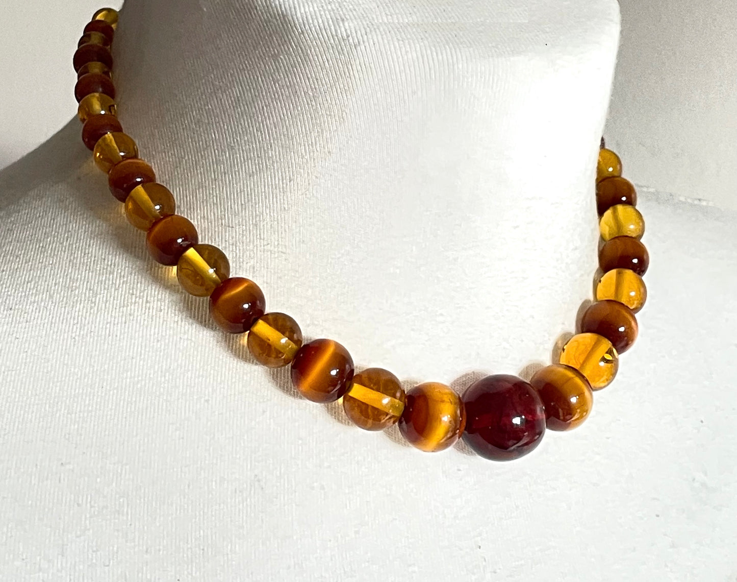 Vintage Louis Rousselet uranium glass Art Deco necklace on foxtail chain - cats' eye UV sensitive and transparent orange beads