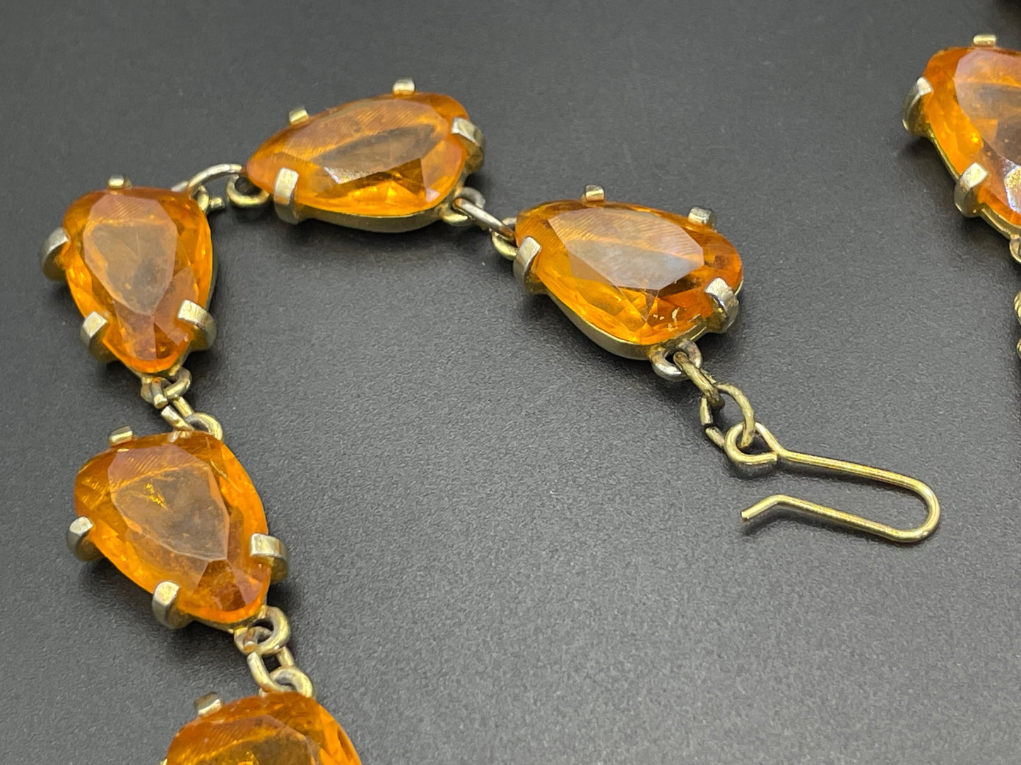 Vintage signed Sphinx citrine yellow / topaz orange glass riviere necklace, triangle shaped crystals set open-backed in gold tone settings