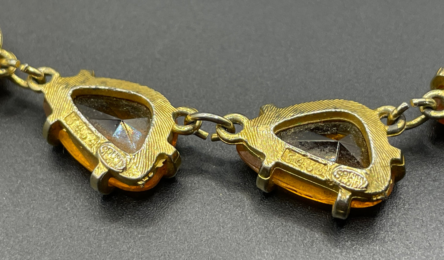 Vintage signed Sphinx citrine yellow / topaz orange glass riviere necklace, triangle shaped crystals set open-backed in gold tone settings