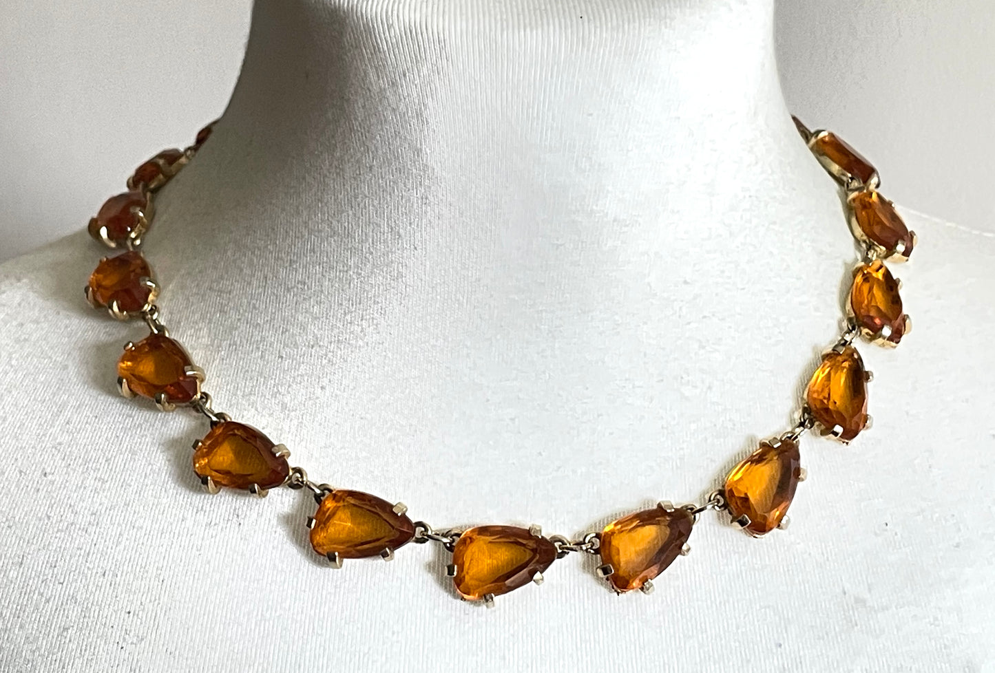 Vintage signed Sphinx citrine yellow / topaz orange glass riviere necklace, triangle shaped crystals set open-backed in gold tone settings