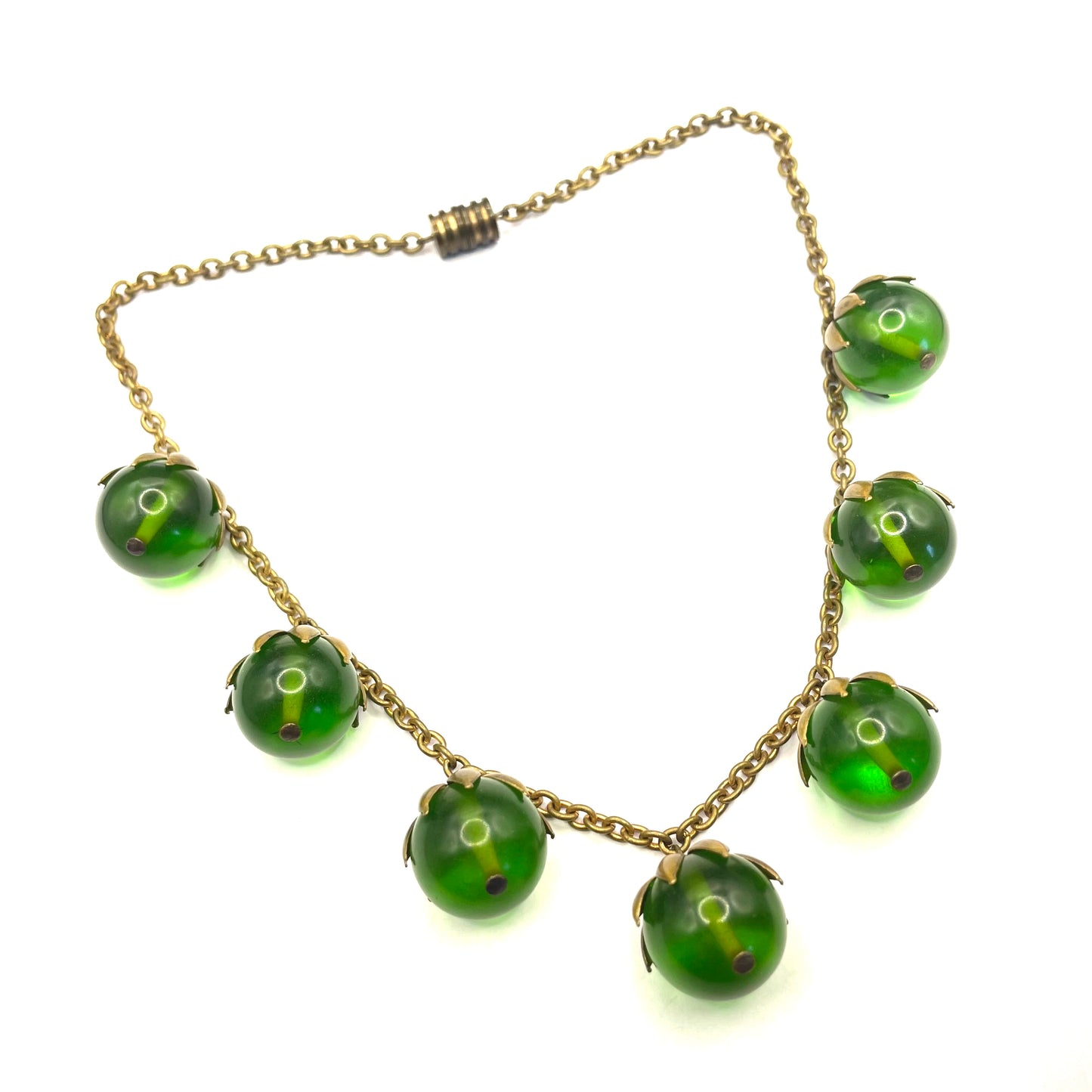 Vintage Art Deco 1930s machine age beaded fringe necklace with early plastic transparent green round chunky beads, antique gold tone links