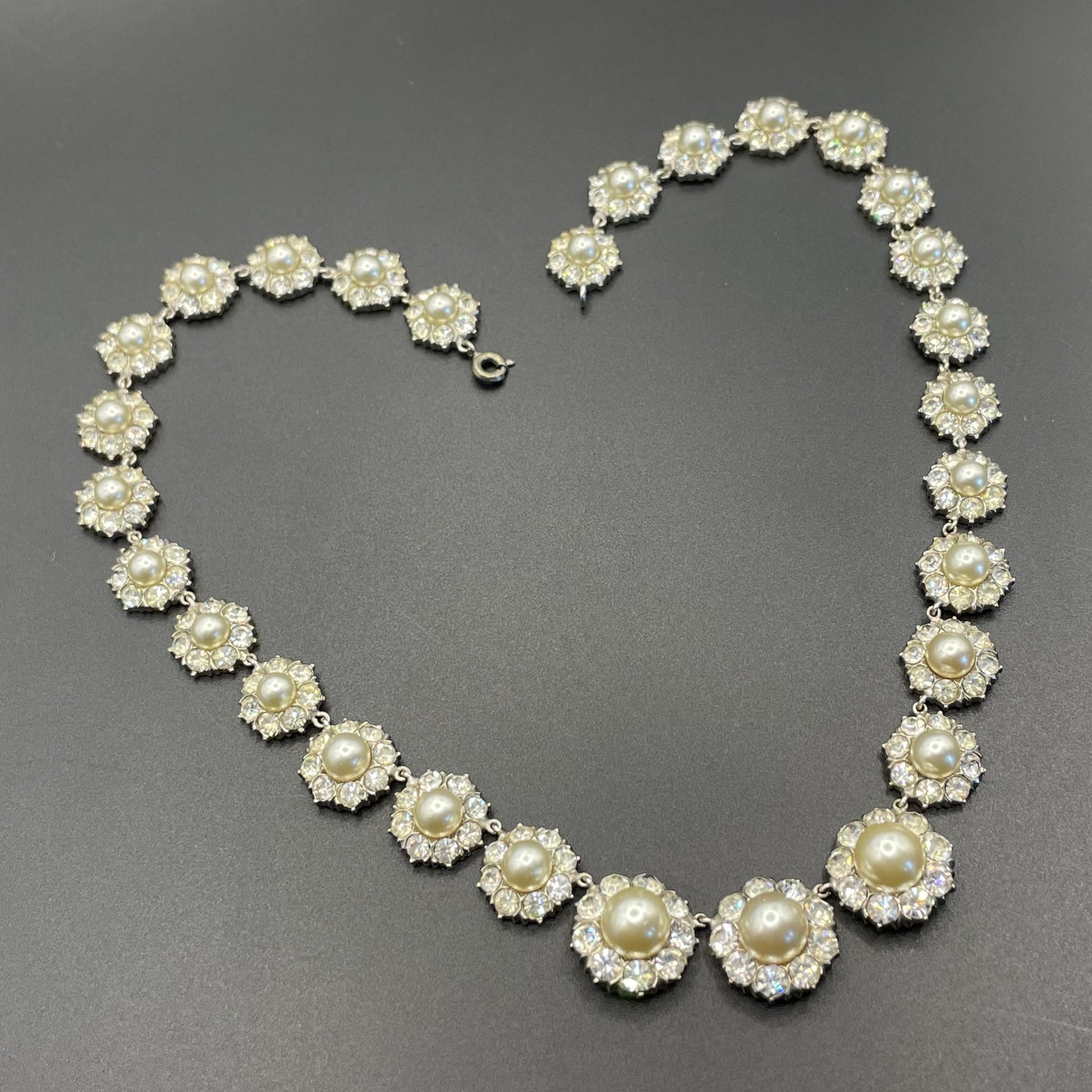Vintage clear rhinestone, glass faux pearl cabochon and silver tone riviere style necklace, beautiful heavy piece, daisy flower design