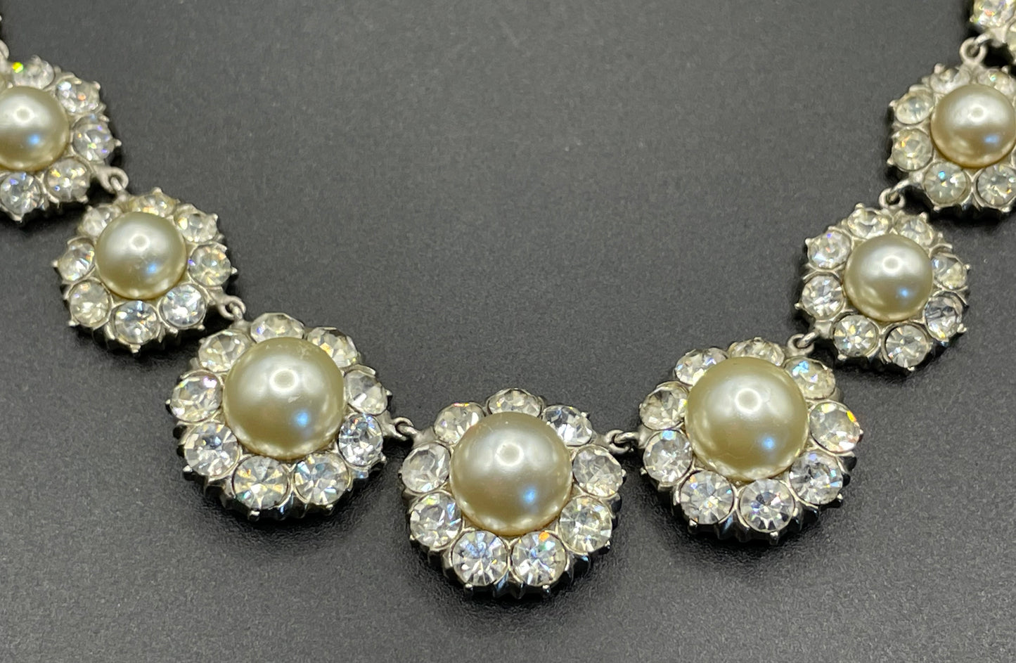 Vintage clear rhinestone, glass faux pearl cabochon and silver tone riviere style necklace, beautiful heavy piece, daisy flower design