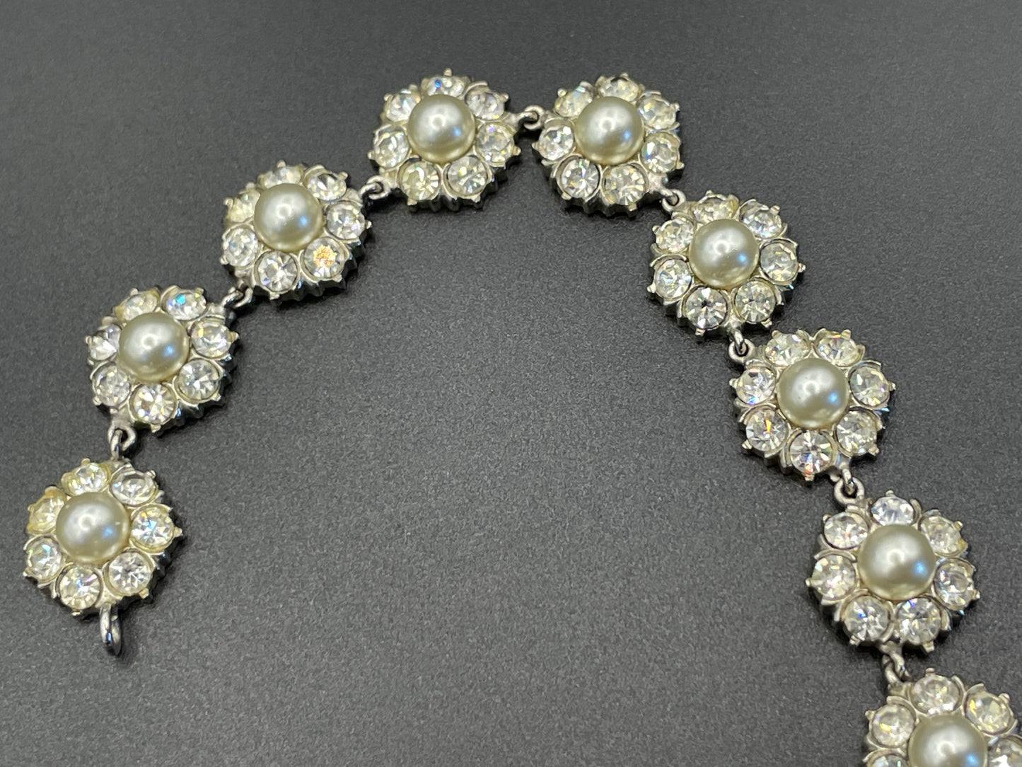 Vintage clear rhinestone, glass faux pearl cabochon and silver tone riviere style necklace, beautiful heavy piece, daisy flower design