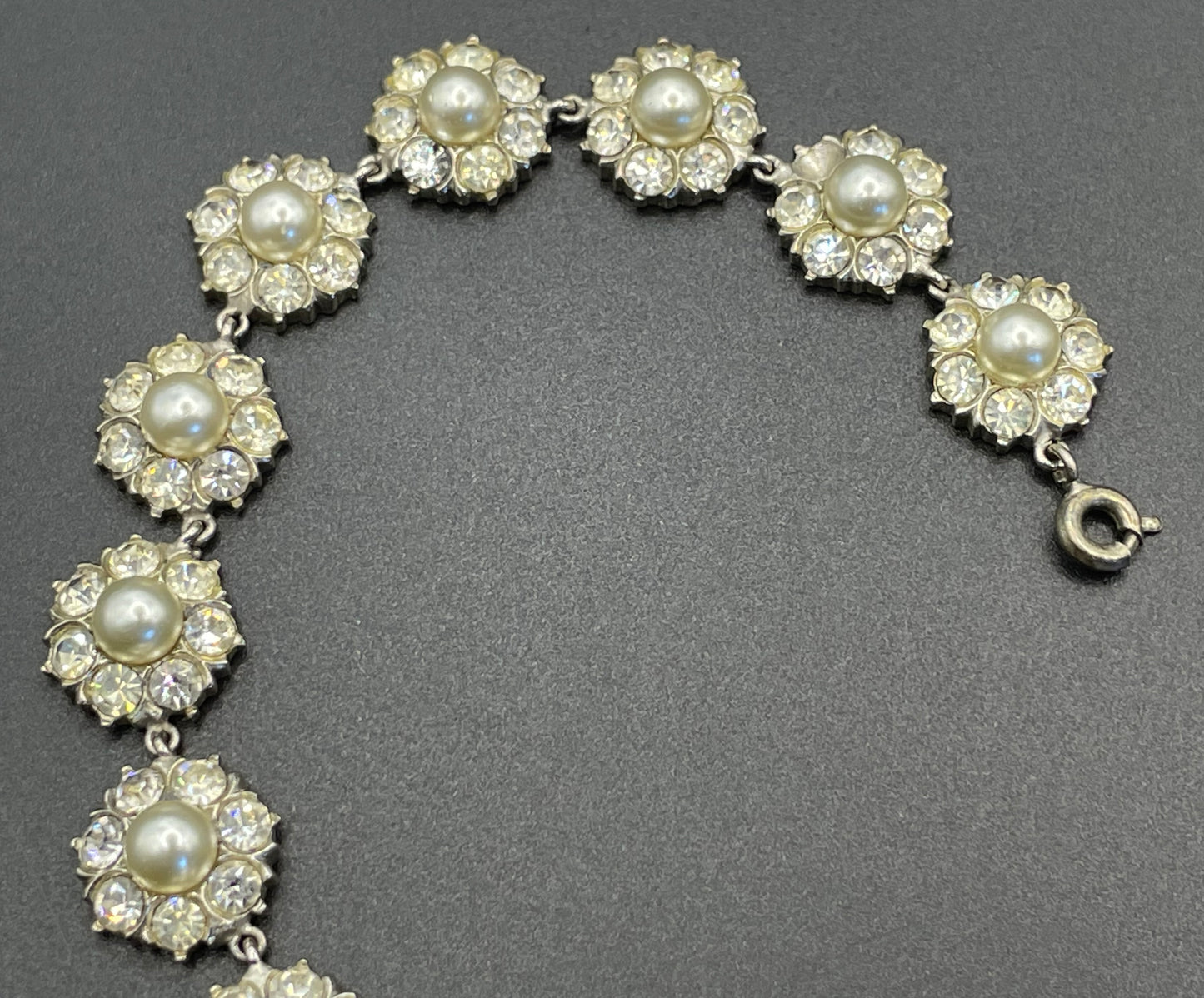 Vintage clear rhinestone, glass faux pearl cabochon and silver tone riviere style necklace, beautiful heavy piece, daisy flower design