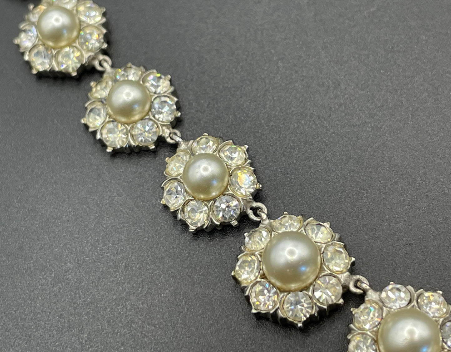Vintage clear rhinestone, glass faux pearl cabochon and silver tone riviere style necklace, beautiful heavy piece, daisy flower design