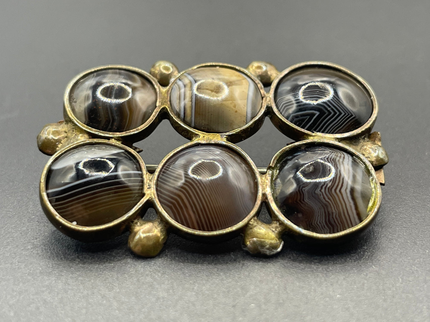 Antique / vintage gold tone brown and white banded agate six cabochon brooch