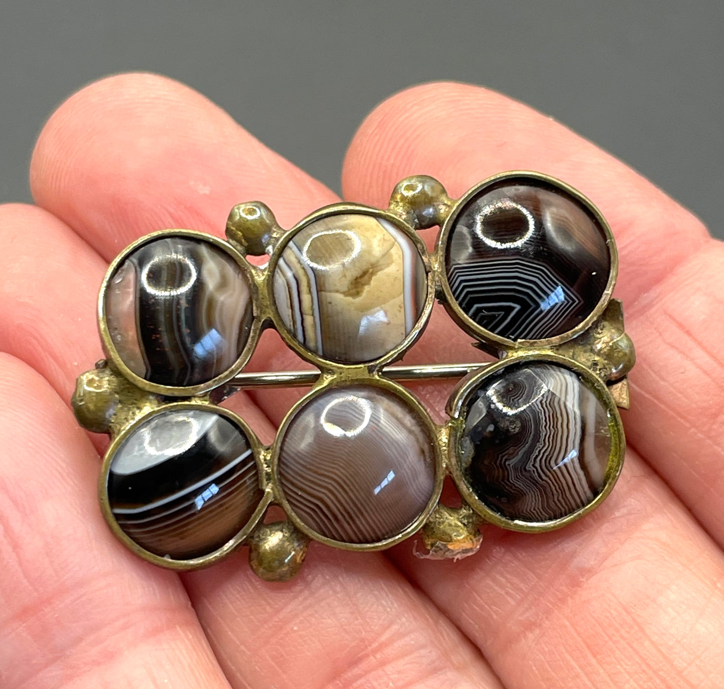 Antique / vintage gold tone brown and white banded agate six cabochon brooch