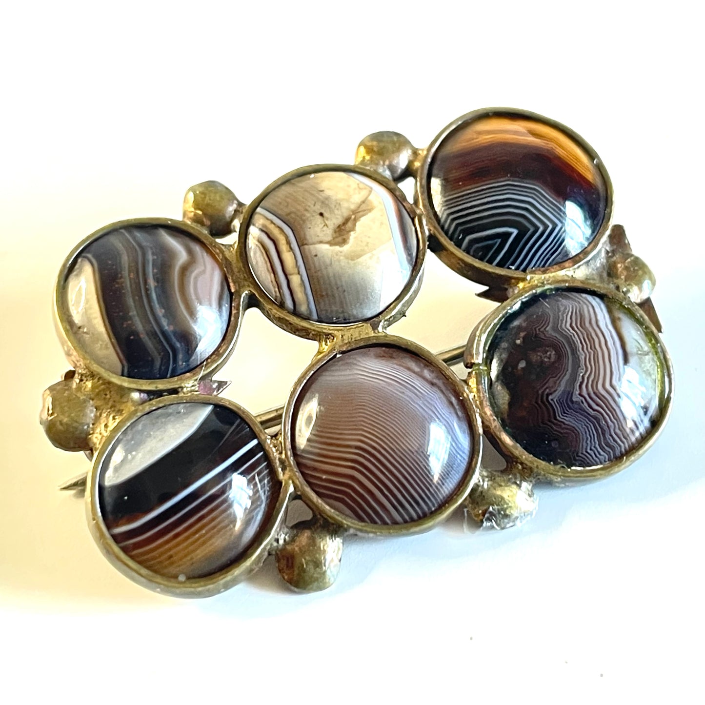 Antique / vintage gold tone brown and white banded agate six cabochon brooch