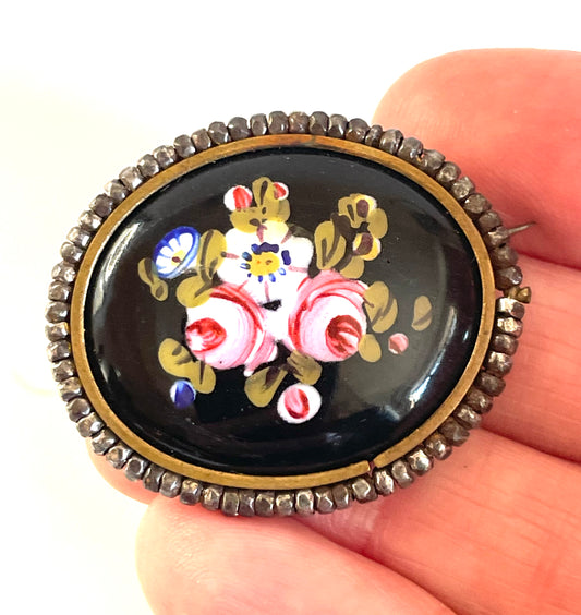 Vintage black enamel and hand-painted floral Victorian brooch - pinchbeck or gold plated with cut steel beaded border