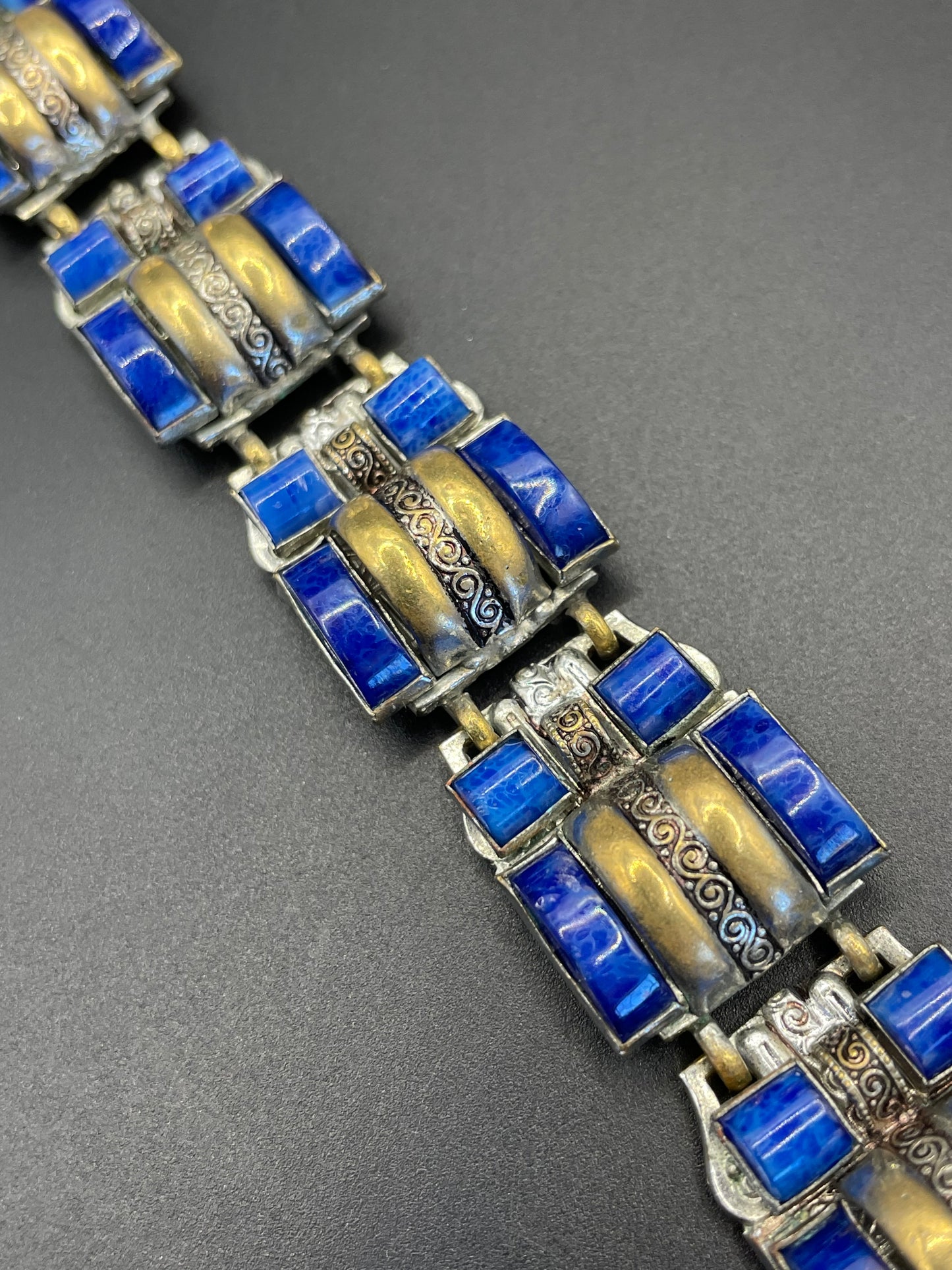Vintage Neiger Brothers Art Deco heavy blue faux lapis lazuli glass panel bracelet with beautiful silver & gold tone features by Max Neiger