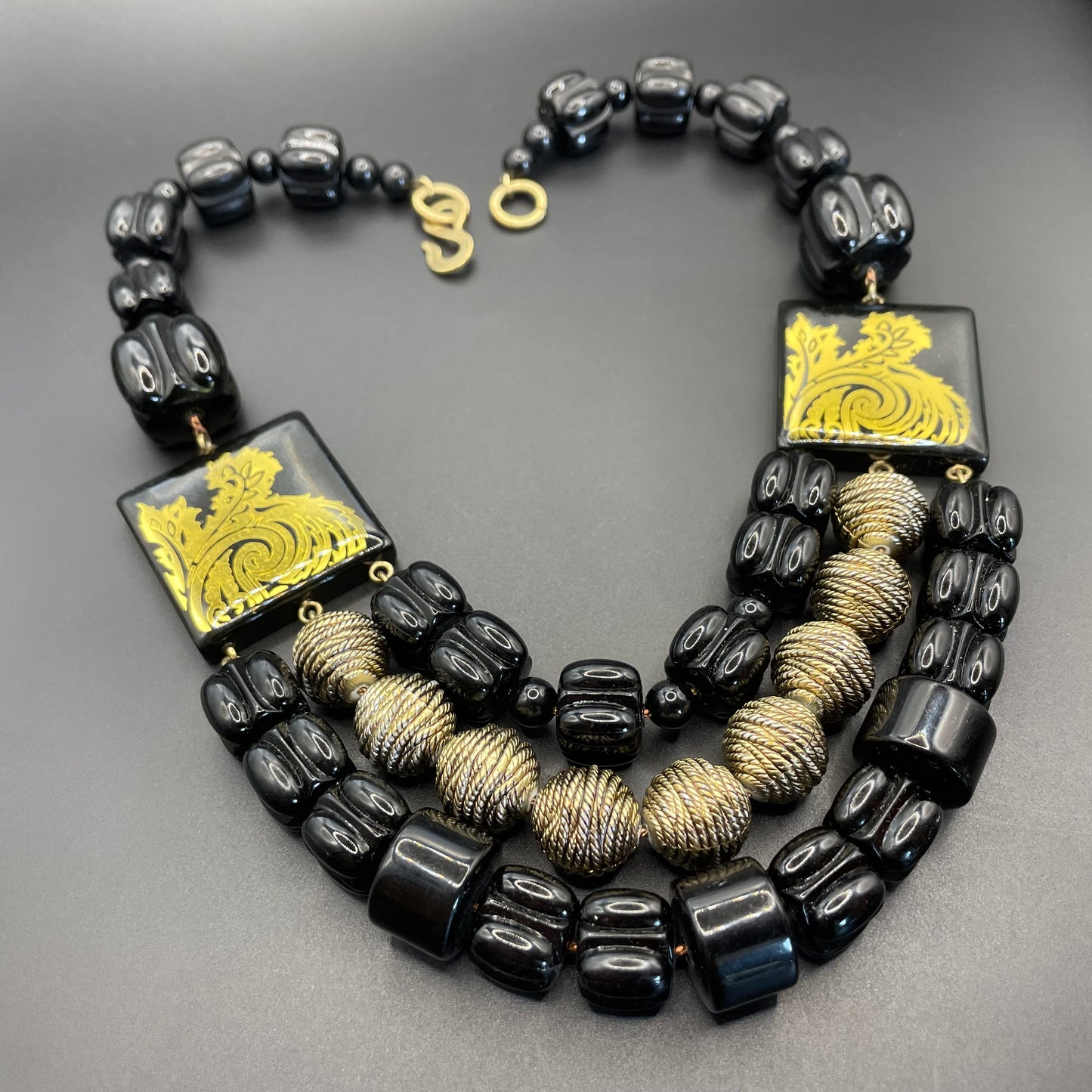 Vintage Christian Dior unsigned 1950s couture chunky early plastic and lucite black and gold beaded triple strand bib necklace