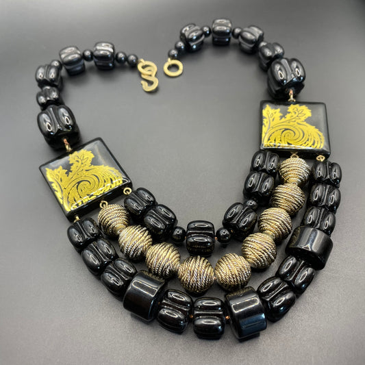 Vintage Christian Dior unsigned 1950s couture chunky early plastic and lucite black and gold beaded triple strand bib necklace