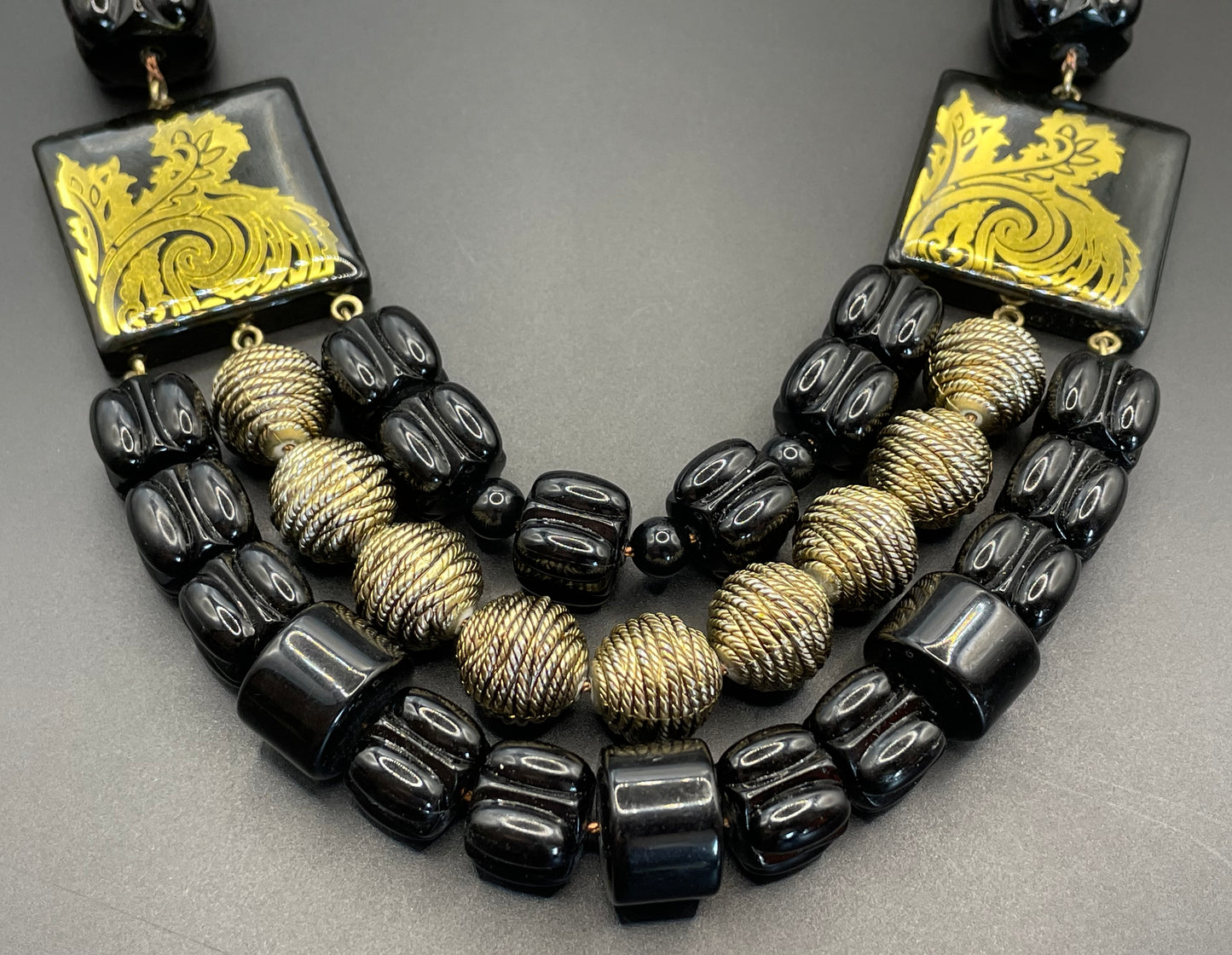 Vintage Christian Dior unsigned 1950s couture chunky early plastic and lucite black and gold beaded triple strand bib necklace