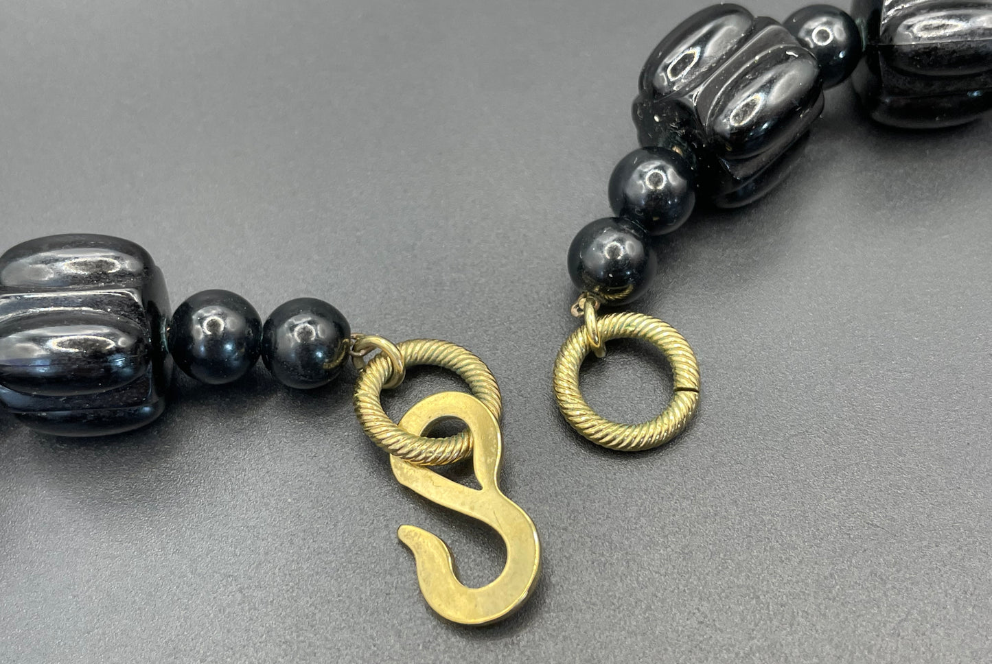 Vintage Christian Dior unsigned 1950s couture chunky early plastic and lucite black and gold beaded triple strand bib necklace