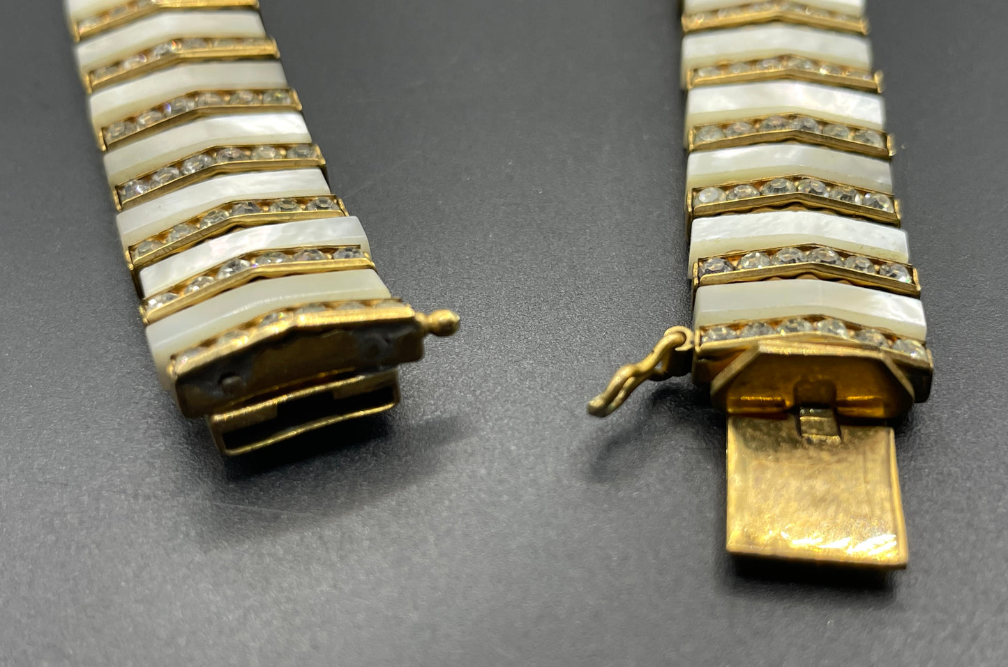 Vintage Schreiber and Hiller signed Esha Randel Art Deco clear rhinestone, carved mother of pearl (MOP) and gold tone choker necklace