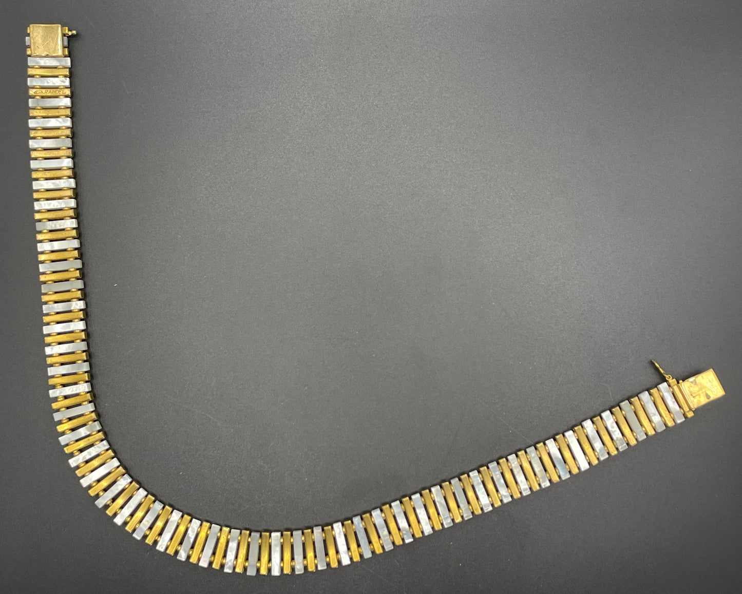Vintage Schreiber and Hiller signed Esha Randel Art Deco clear rhinestone, carved mother of pearl (MOP) and gold tone choker necklace