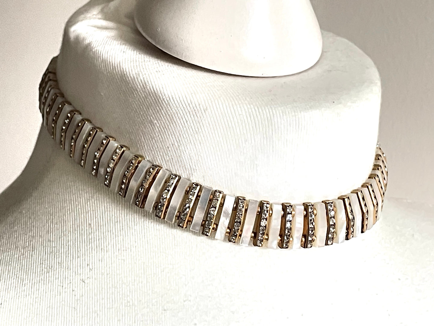 Vintage Schreiber and Hiller signed Esha Randel Art Deco clear rhinestone, carved mother of pearl (MOP) and gold tone choker necklace