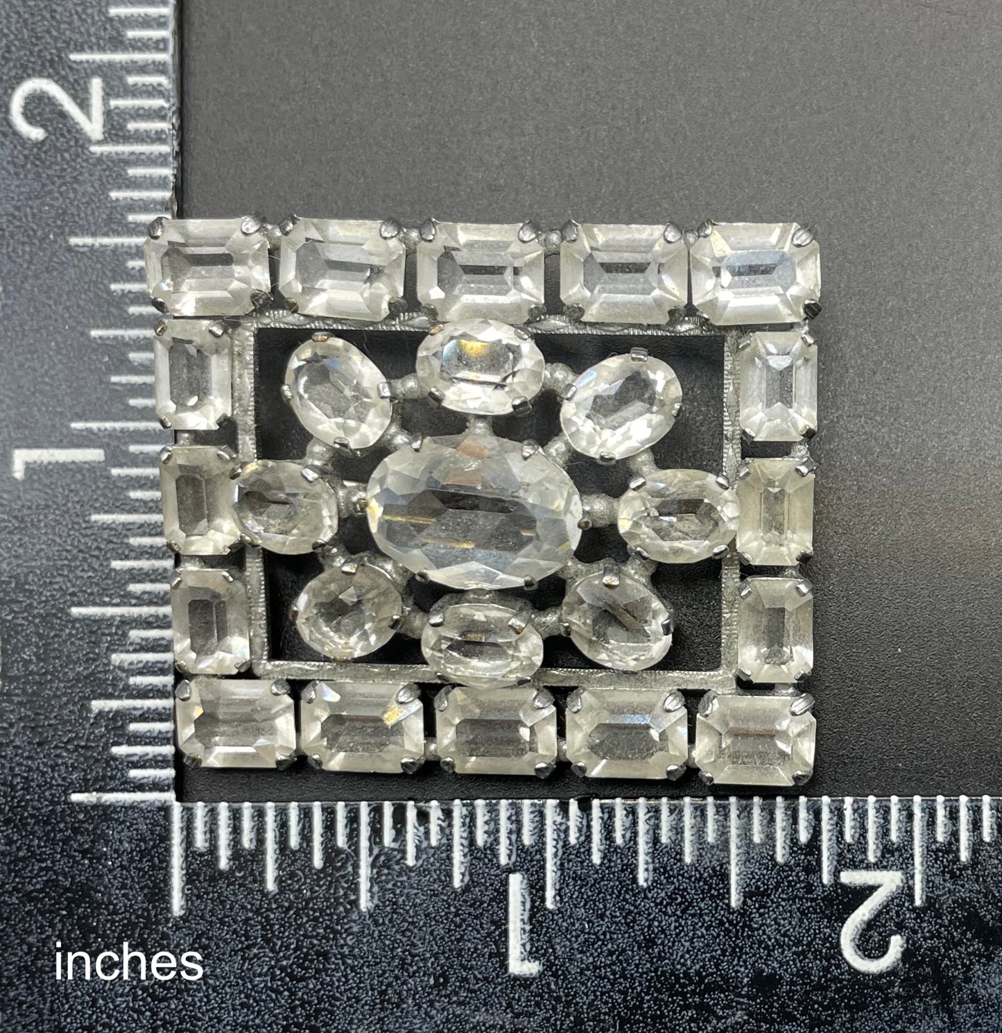 Vintage Art Deco ice clear crystal paste brooch, open-backed baguette cut rectangular and oval cut glass rhinestones