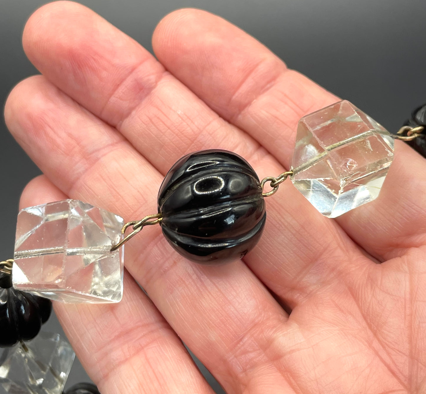 Vintage Art Deco chunky clear crystal faceted bead and carved early plastic melon / pumpkin bead necklace, with rolled gold wires