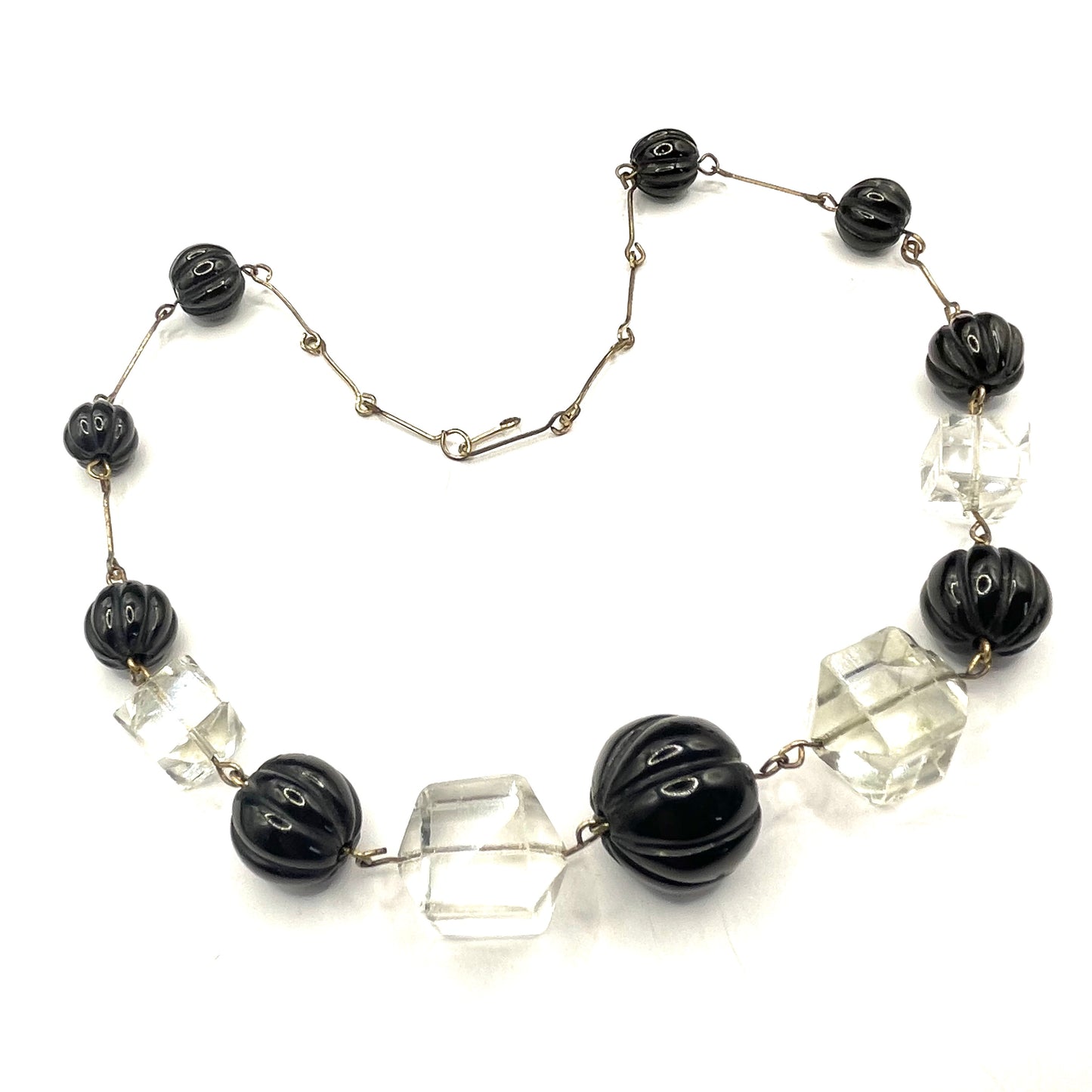 Vintage Art Deco chunky clear crystal faceted bead and carved early plastic melon / pumpkin bead necklace, with rolled gold wires