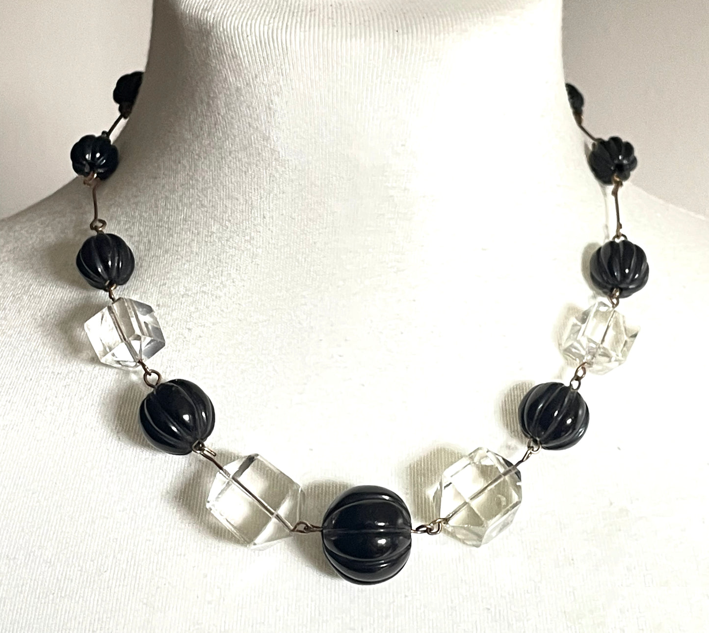 Vintage Art Deco chunky clear crystal faceted bead and carved early plastic melon / pumpkin bead necklace, with rolled gold wires
