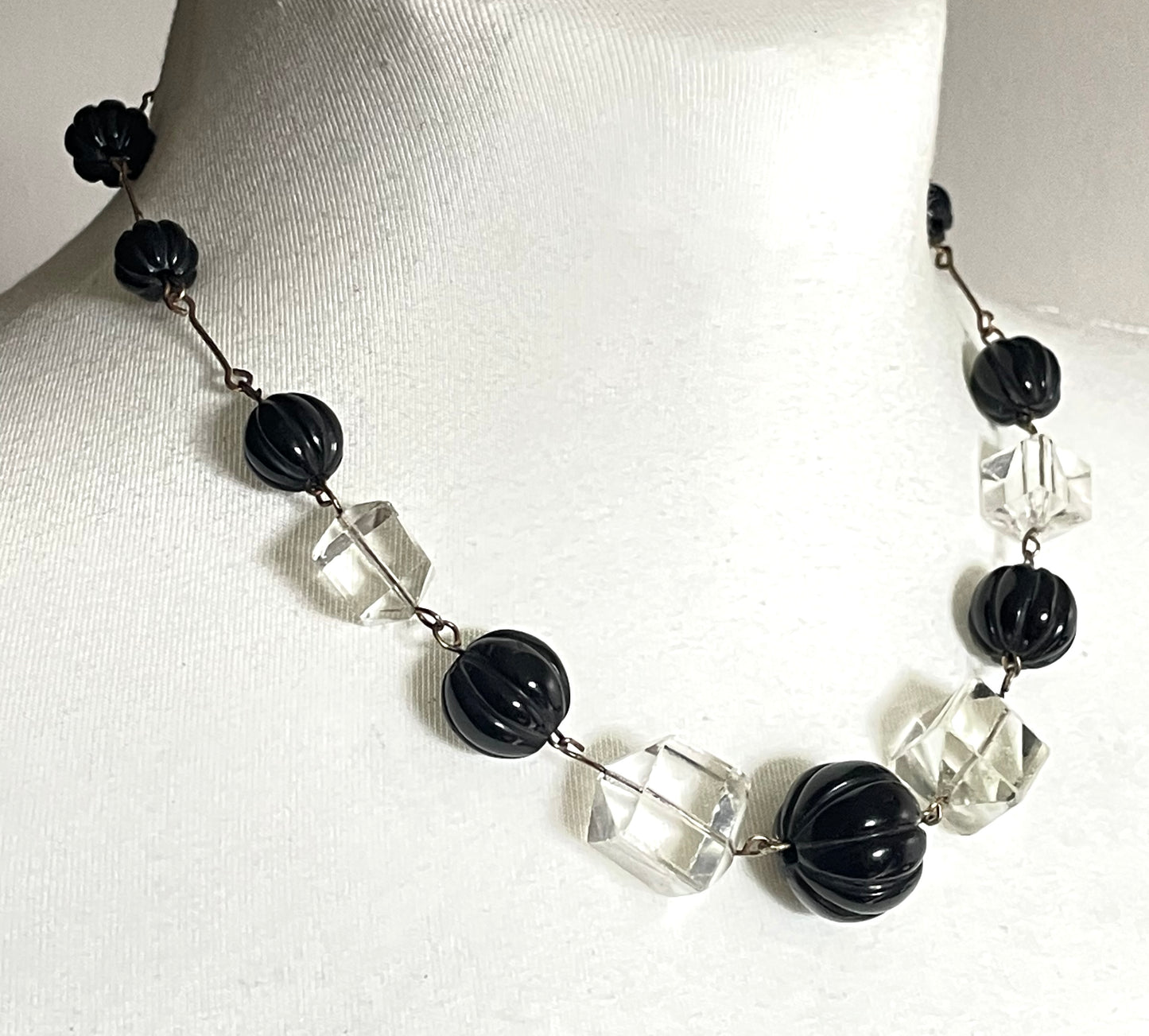 Vintage Art Deco chunky clear crystal faceted bead and carved early plastic melon / pumpkin bead necklace, with rolled gold wires
